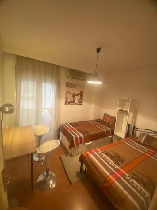 Three-Bedroom Apartment with Balcony