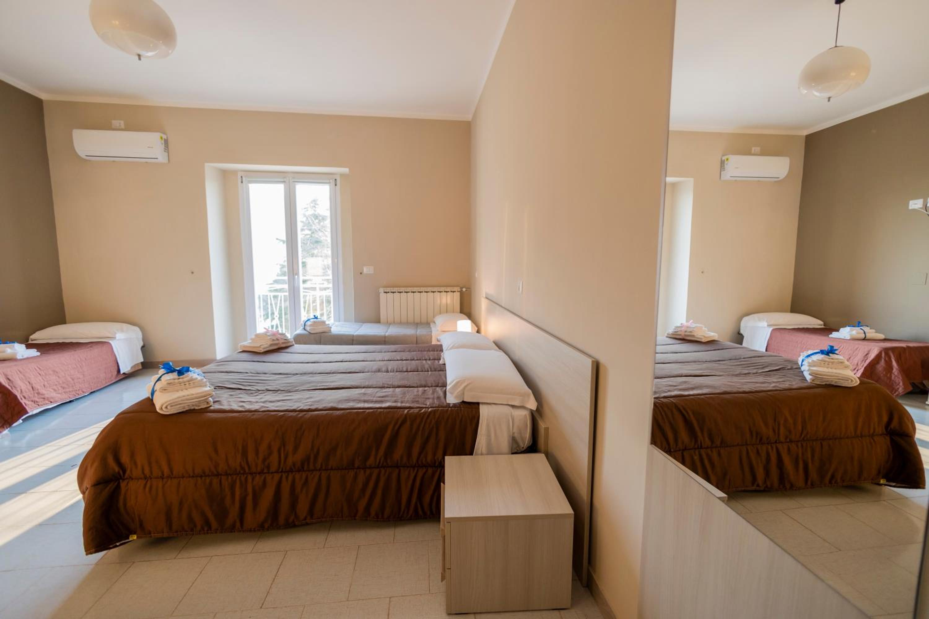 Deluxe Quadruple Room with Balcony photo 1