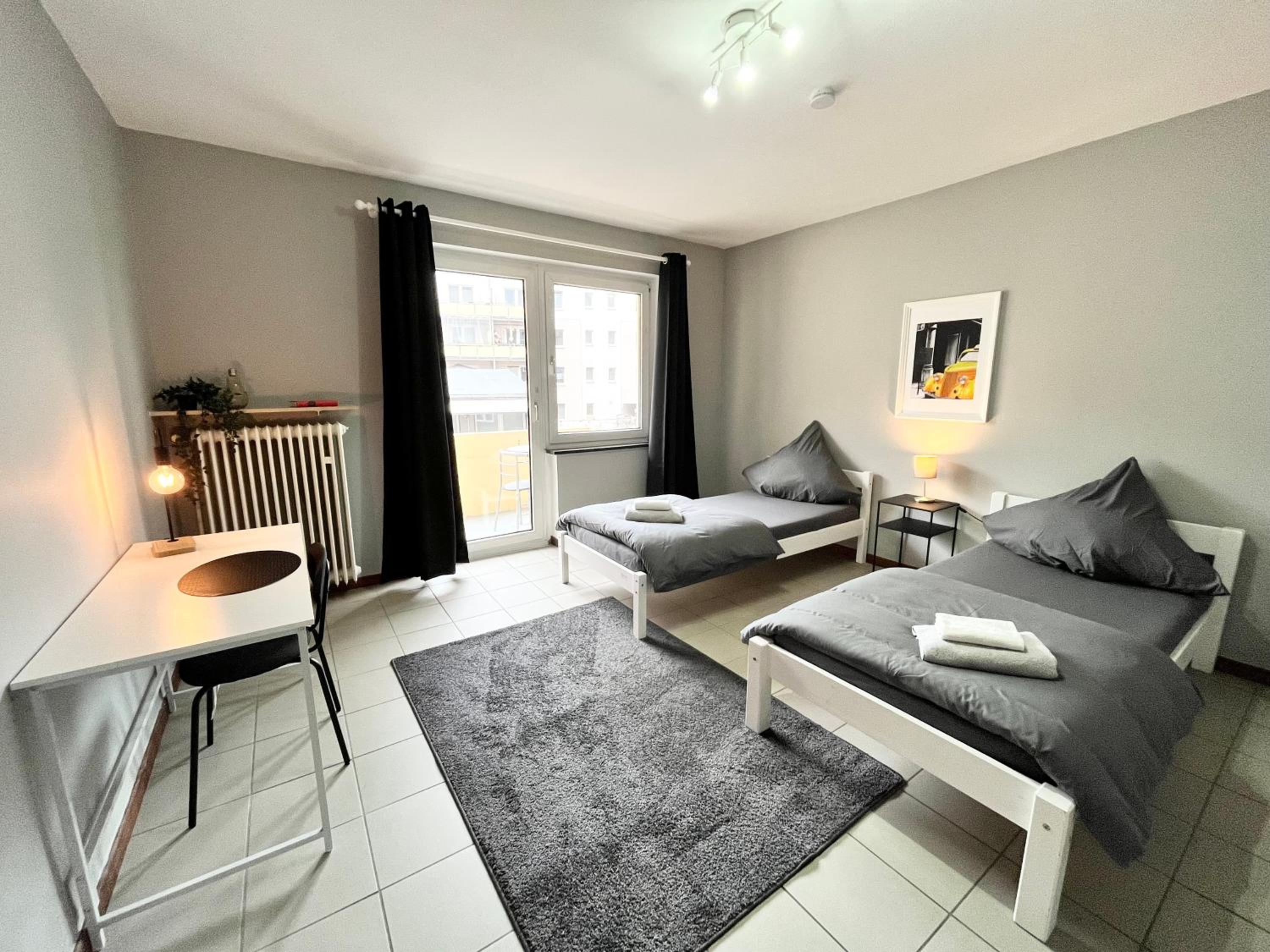 Three-Bedroom Apartment photo 1