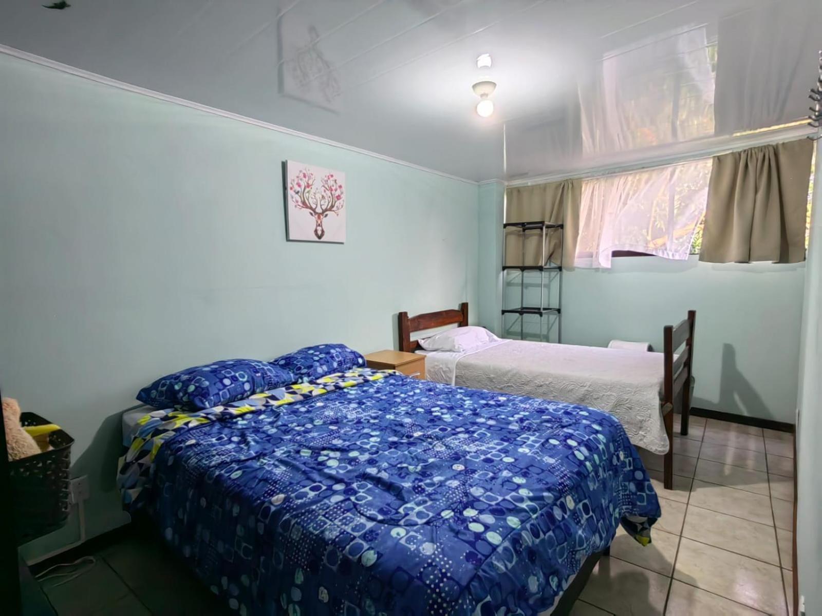 Basic Triple Room With Shared Bathroom photo 1