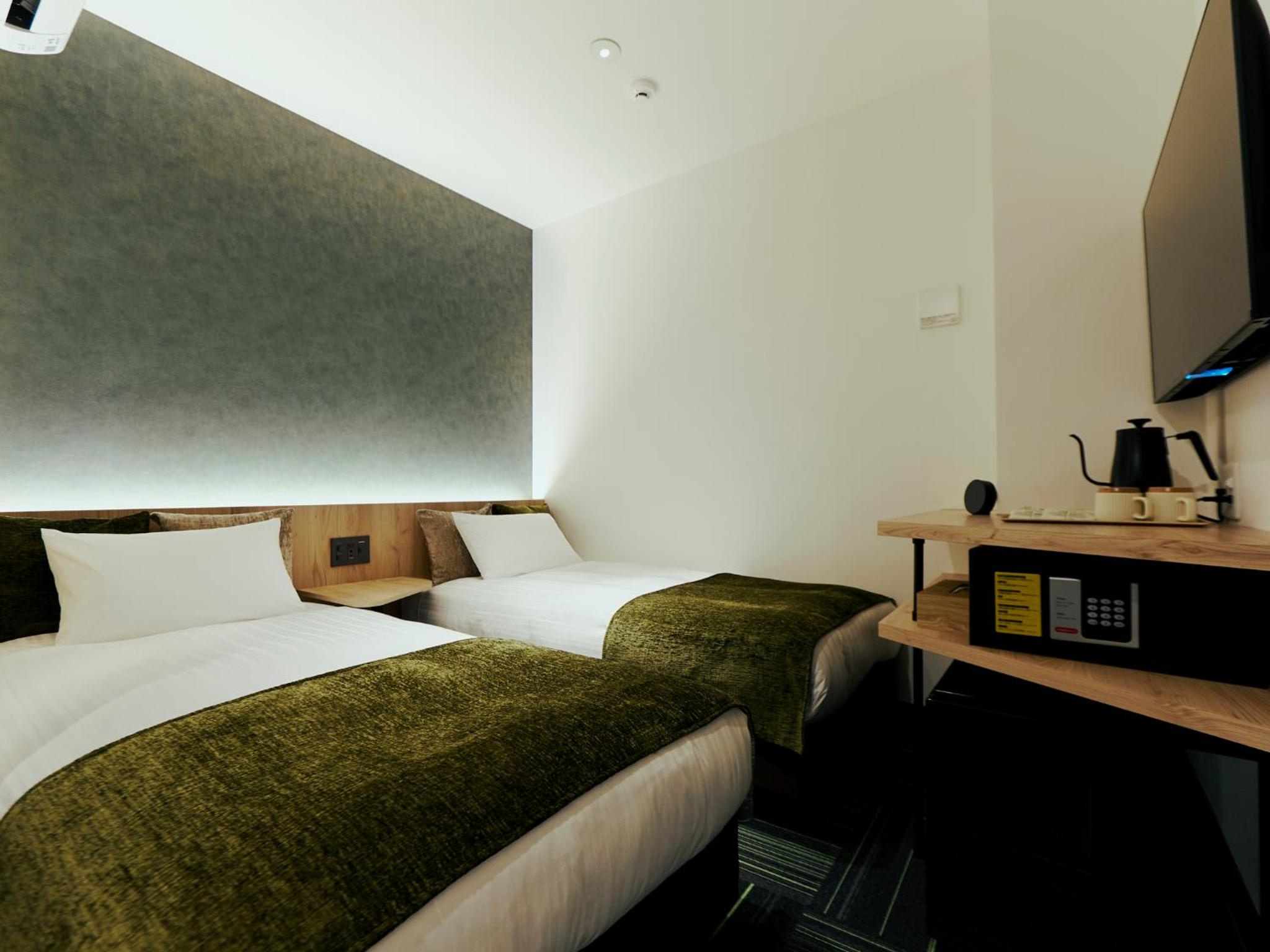 Twin Room - Photo 14