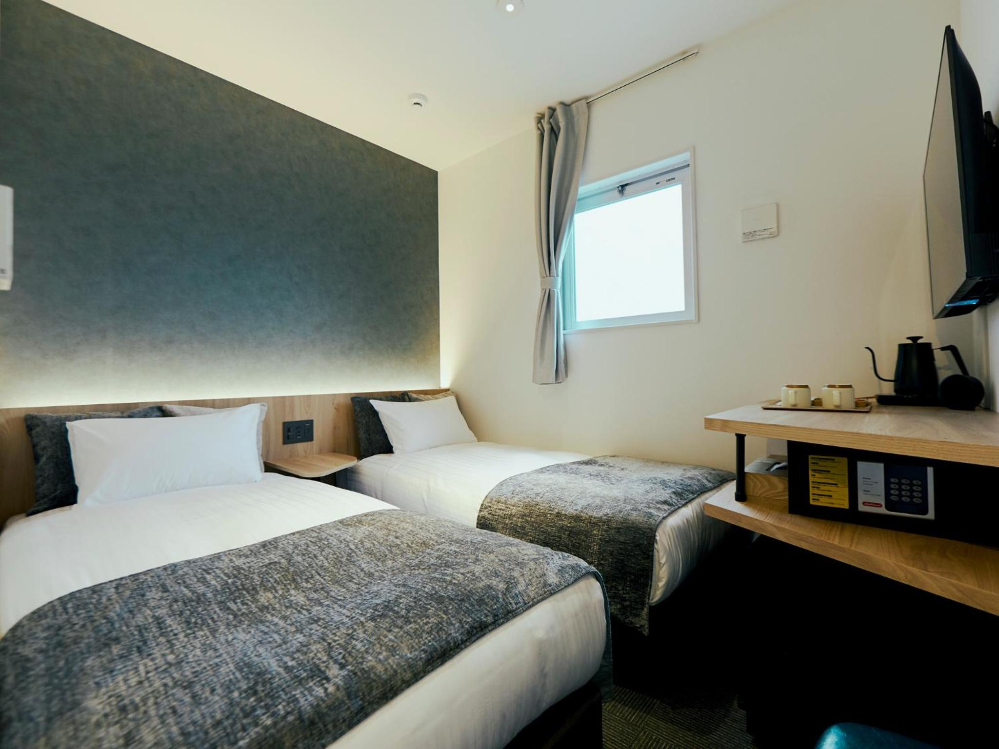 Twin Room - Photo 5