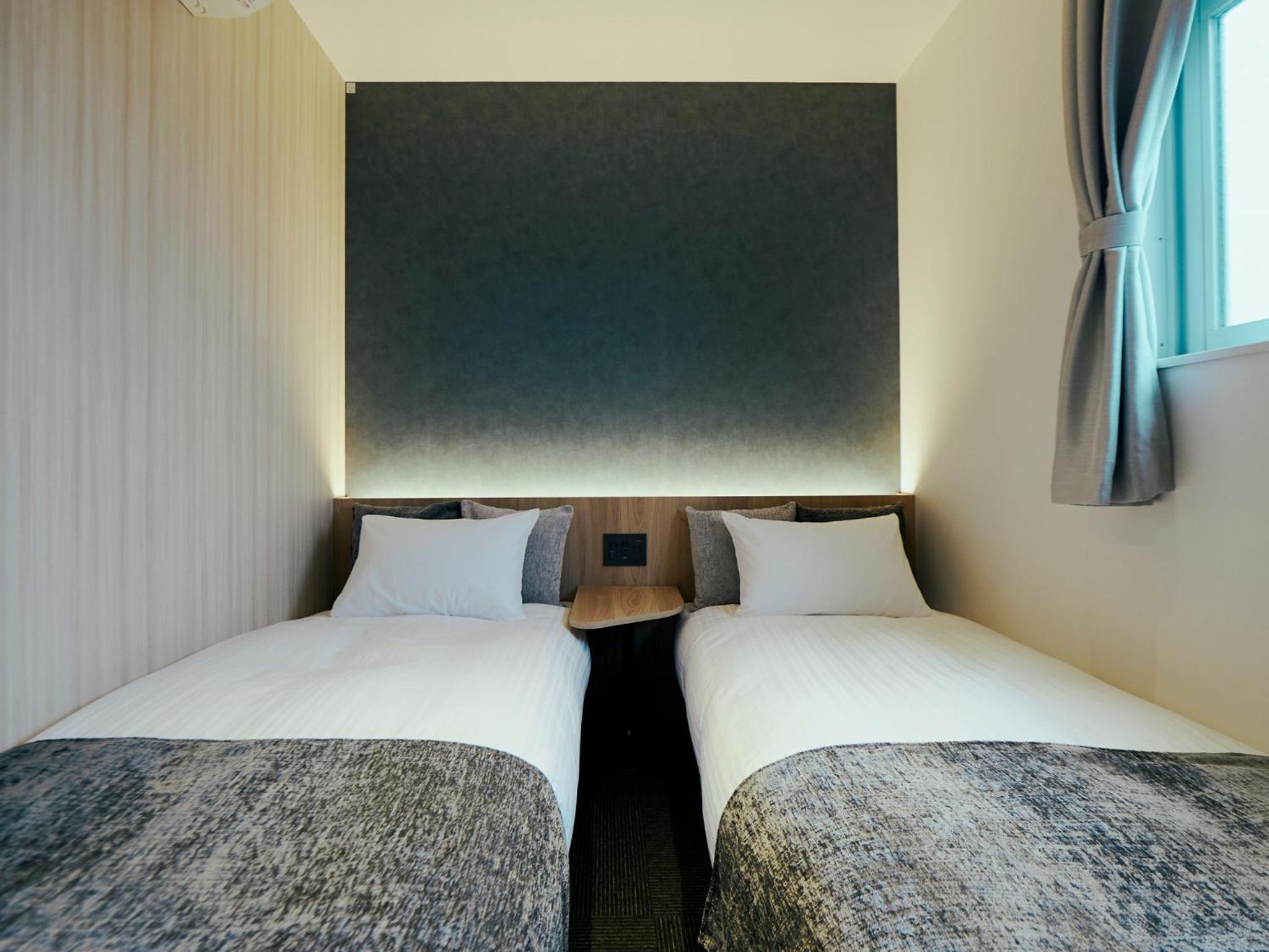Twin Room - Photo 8