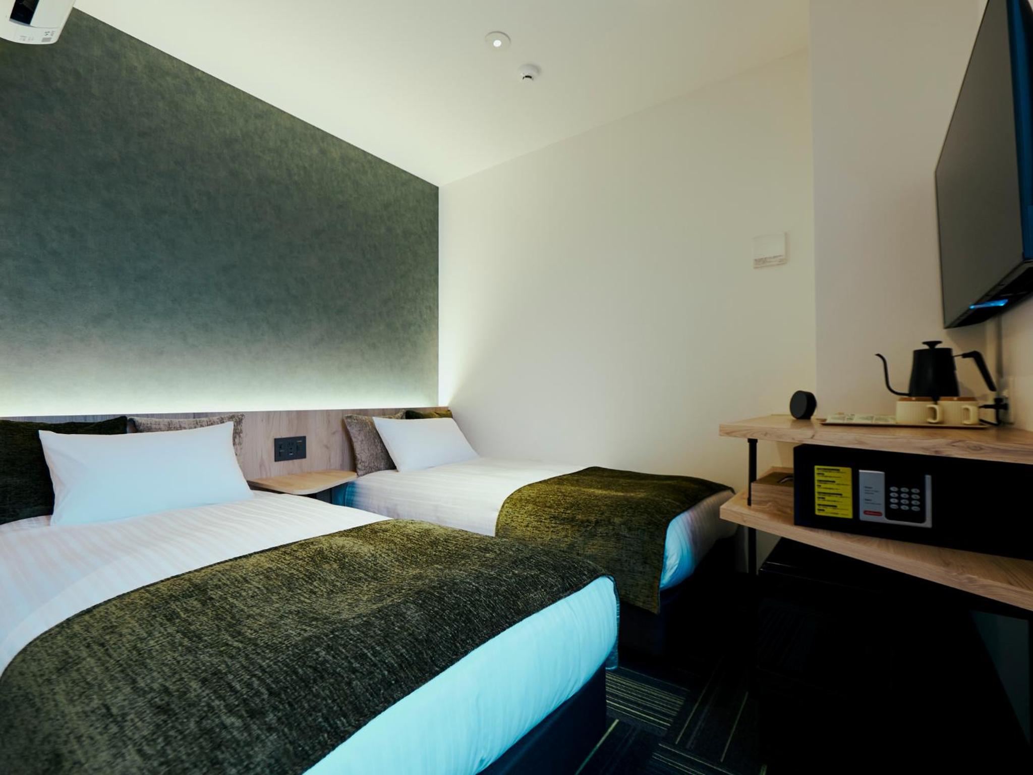 Twin Room - Photo 7