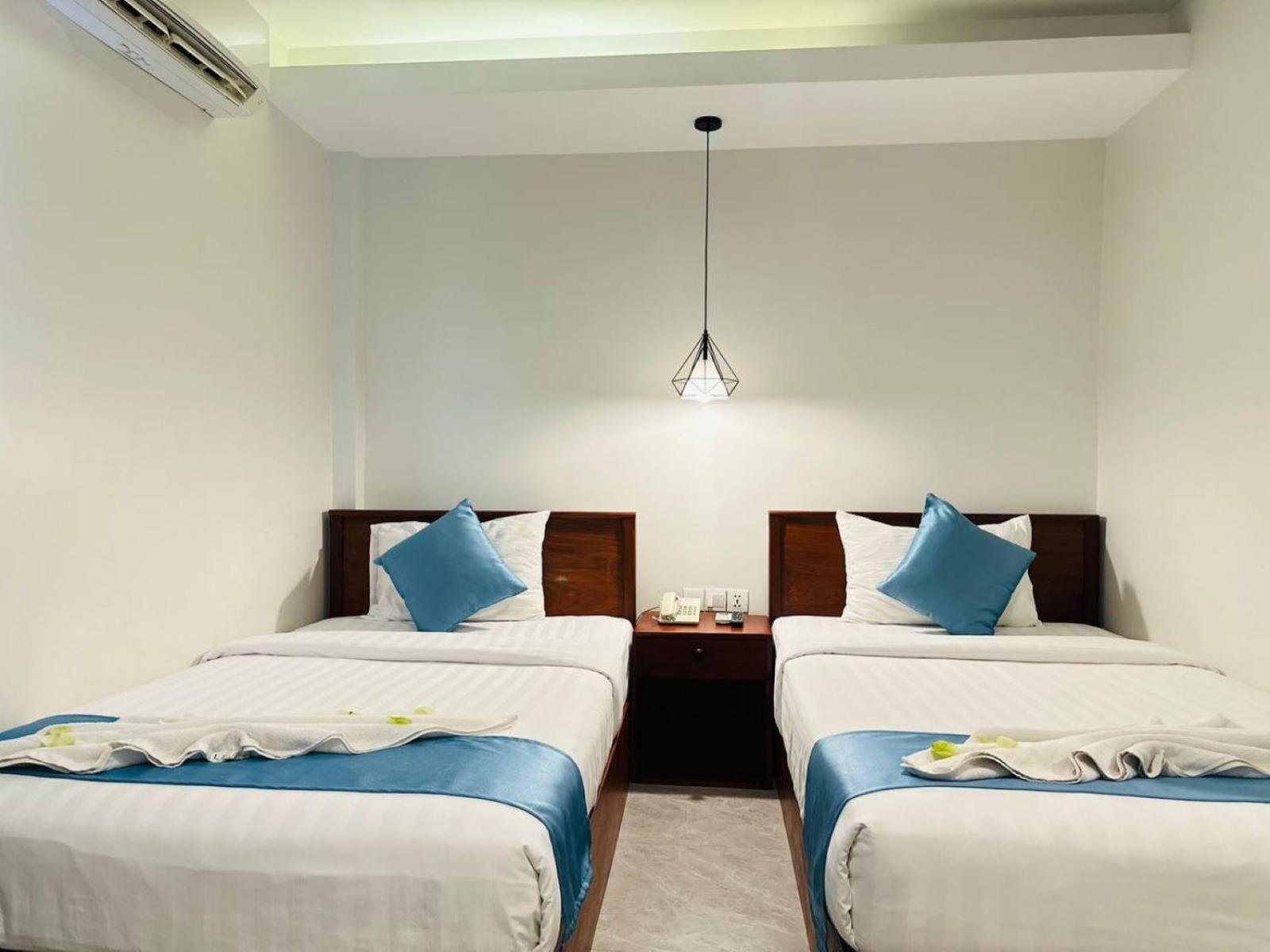 Twin Room - Photo 12