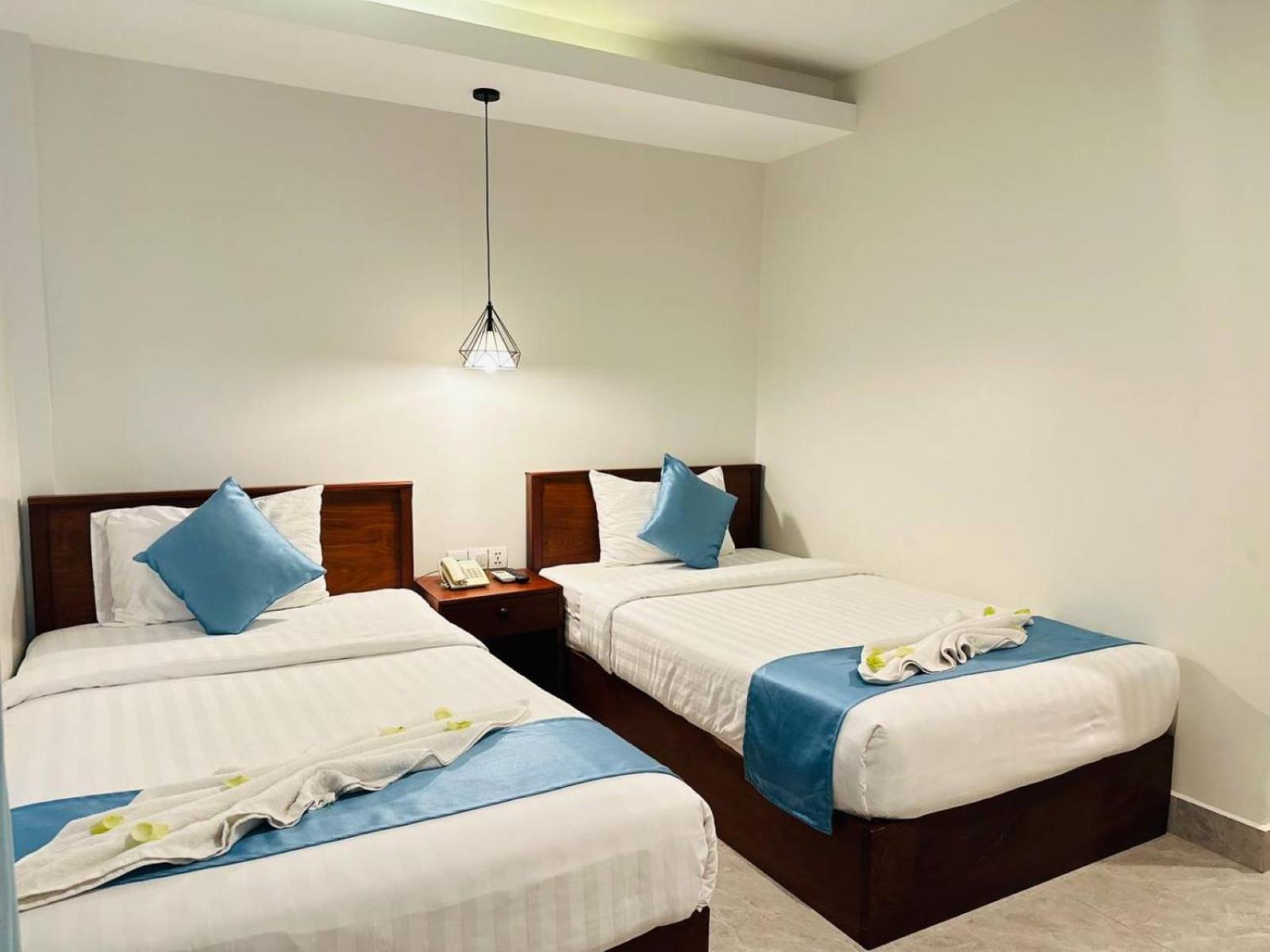 Twin Room - Photo 14