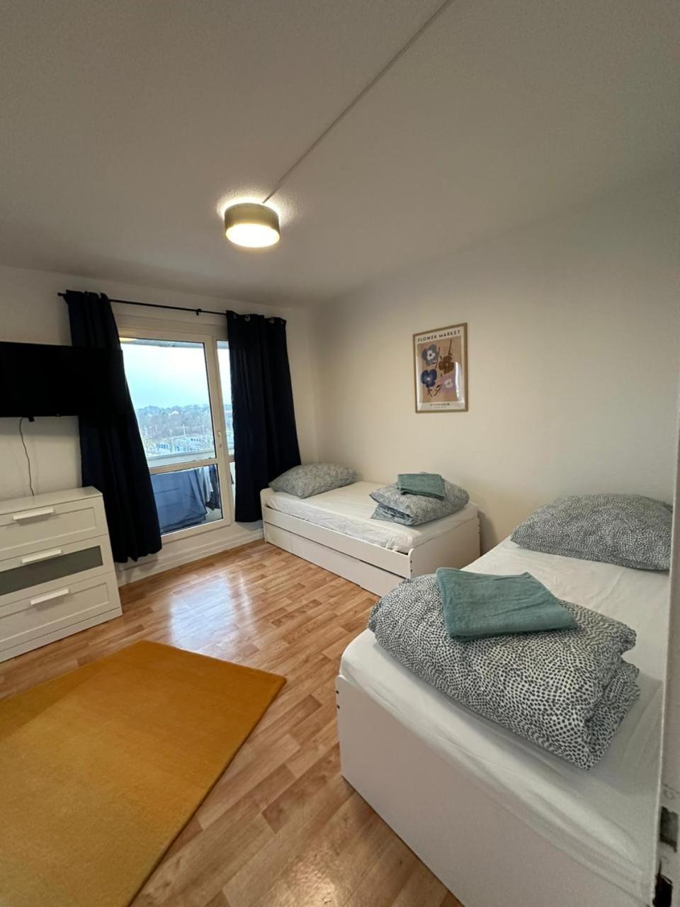 Three-Bedroom Apartment photo 1