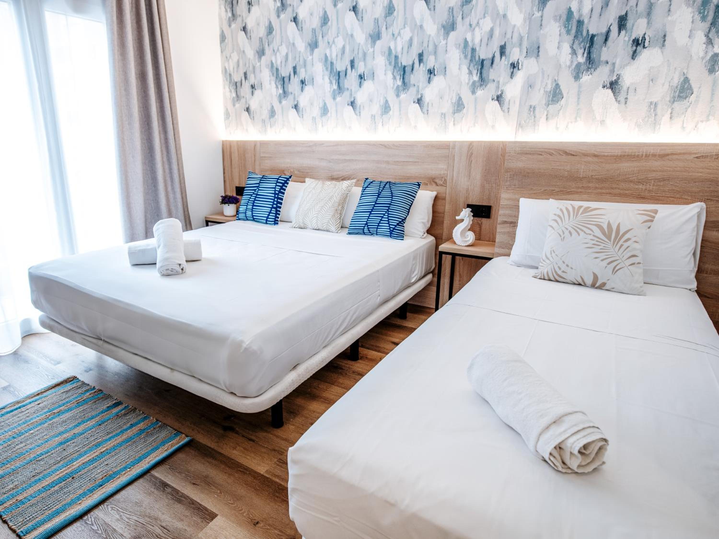 Habitación Triple con Balcón