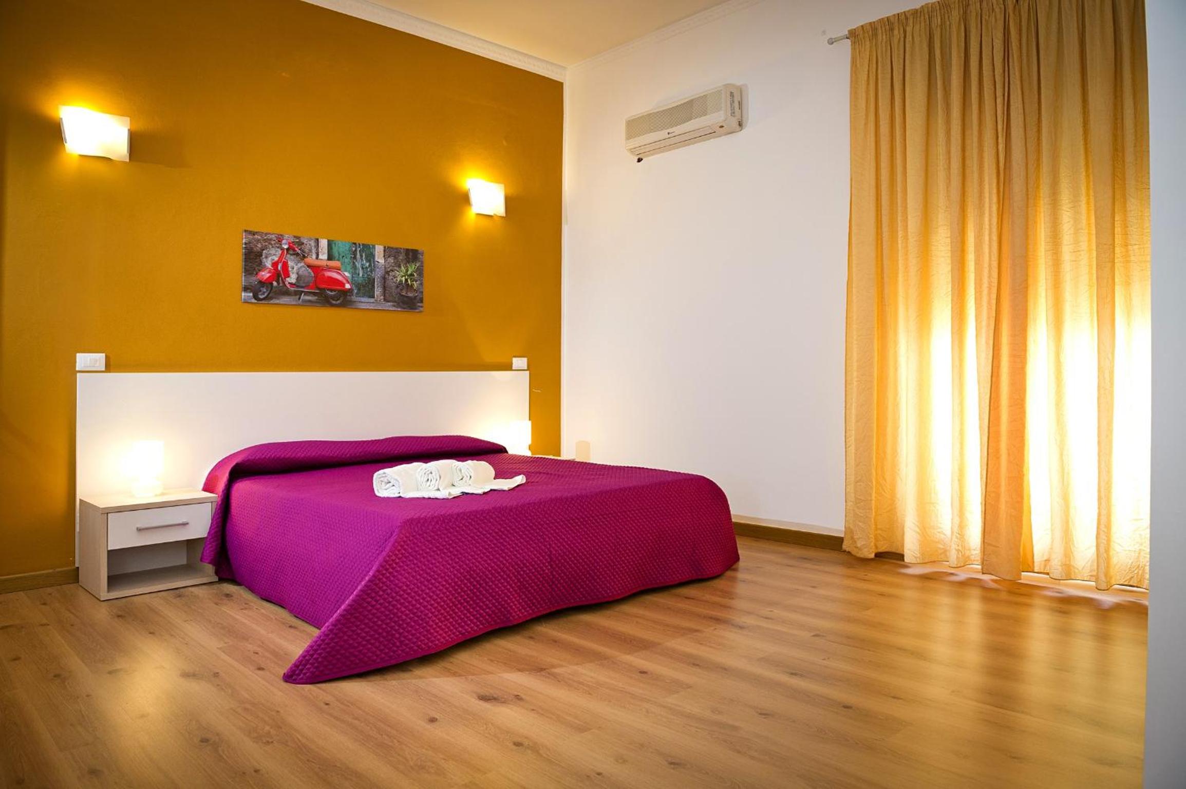 Quadruple Room with Balcony
