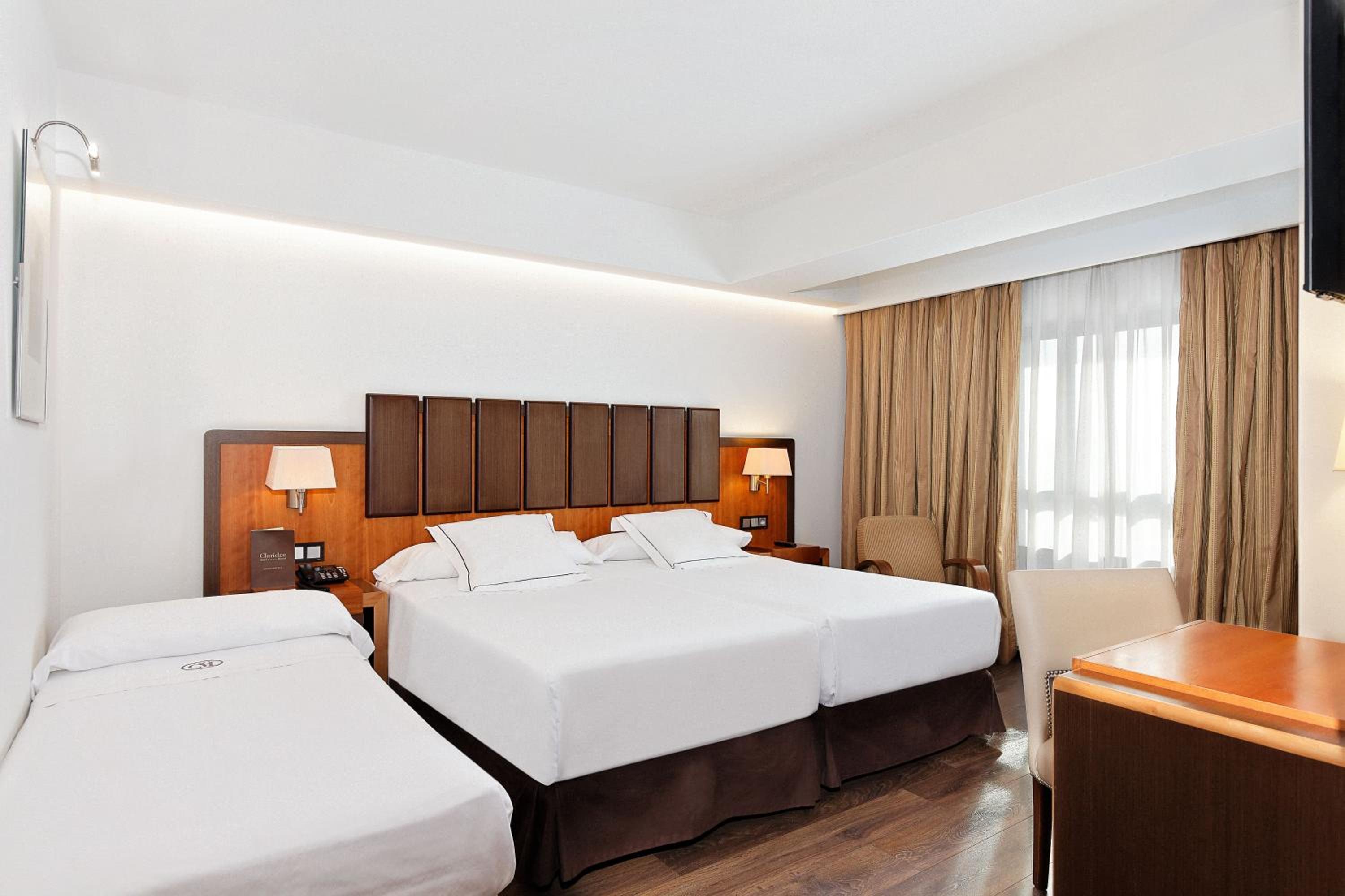 Triple Room (2 Adults + 1 Child) photo 2