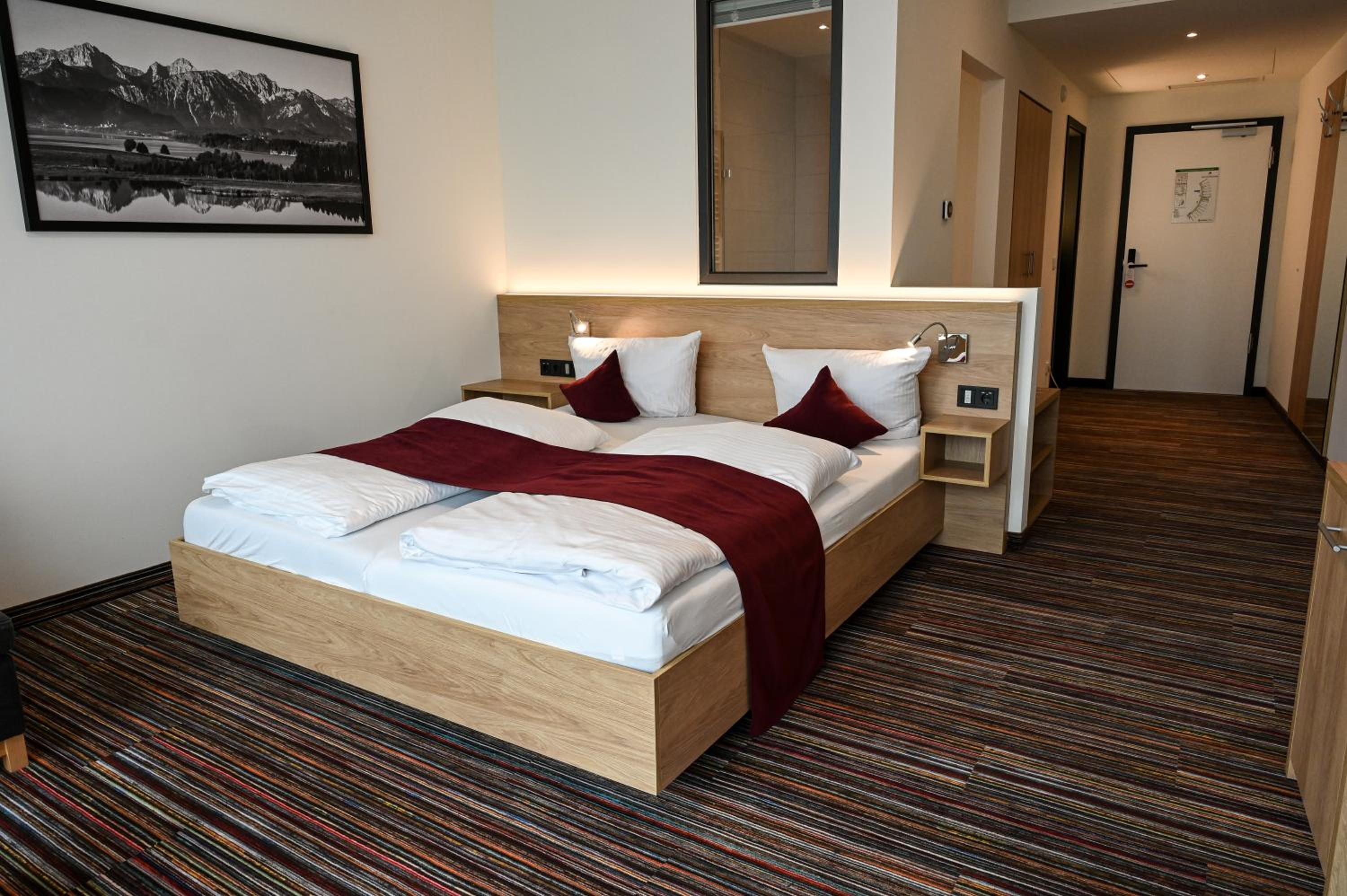 Deluxe Double Room with Balcony - Photo 1
