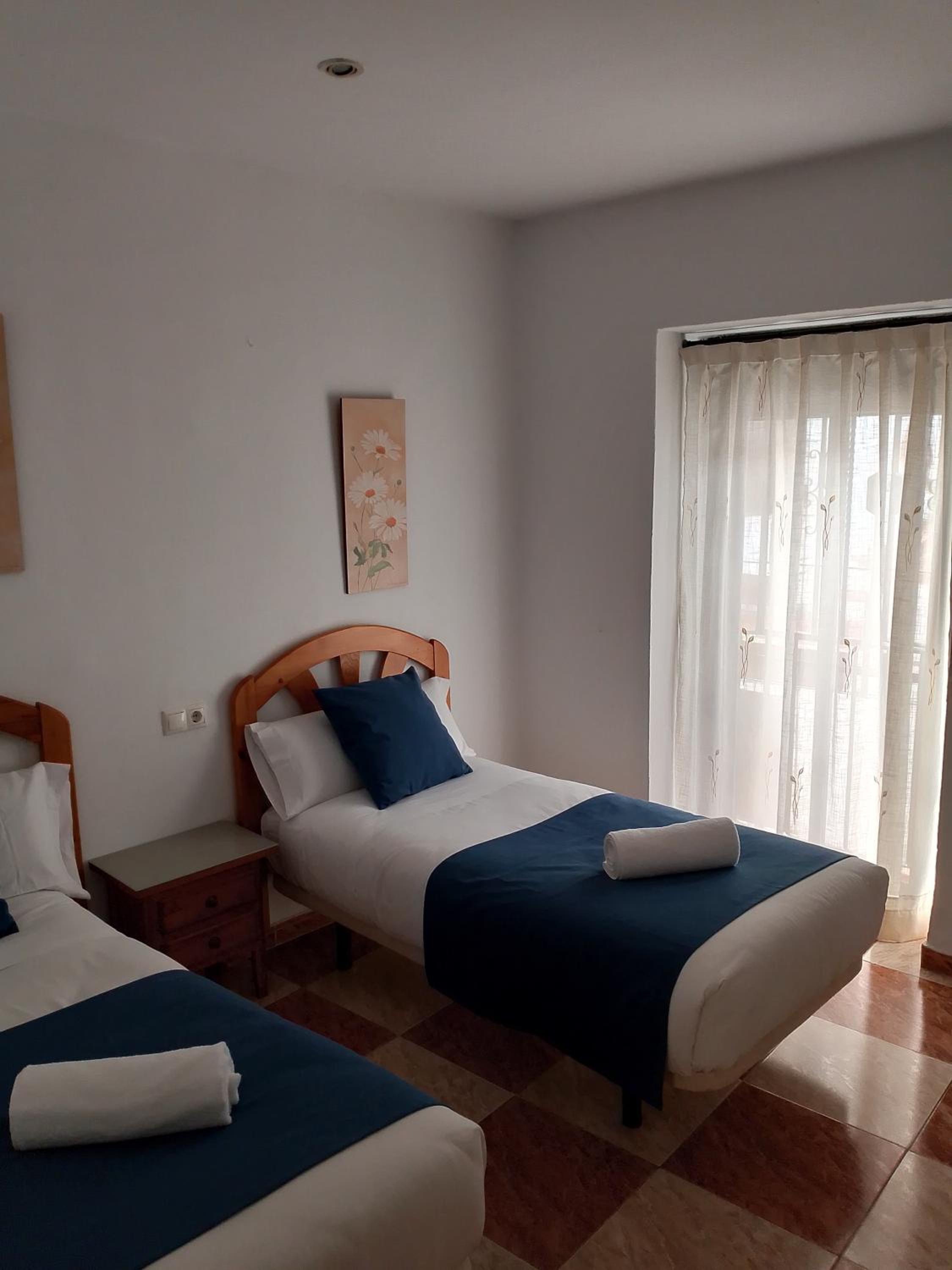 Habitación Estándar con Dos Camas y Baño Compartido