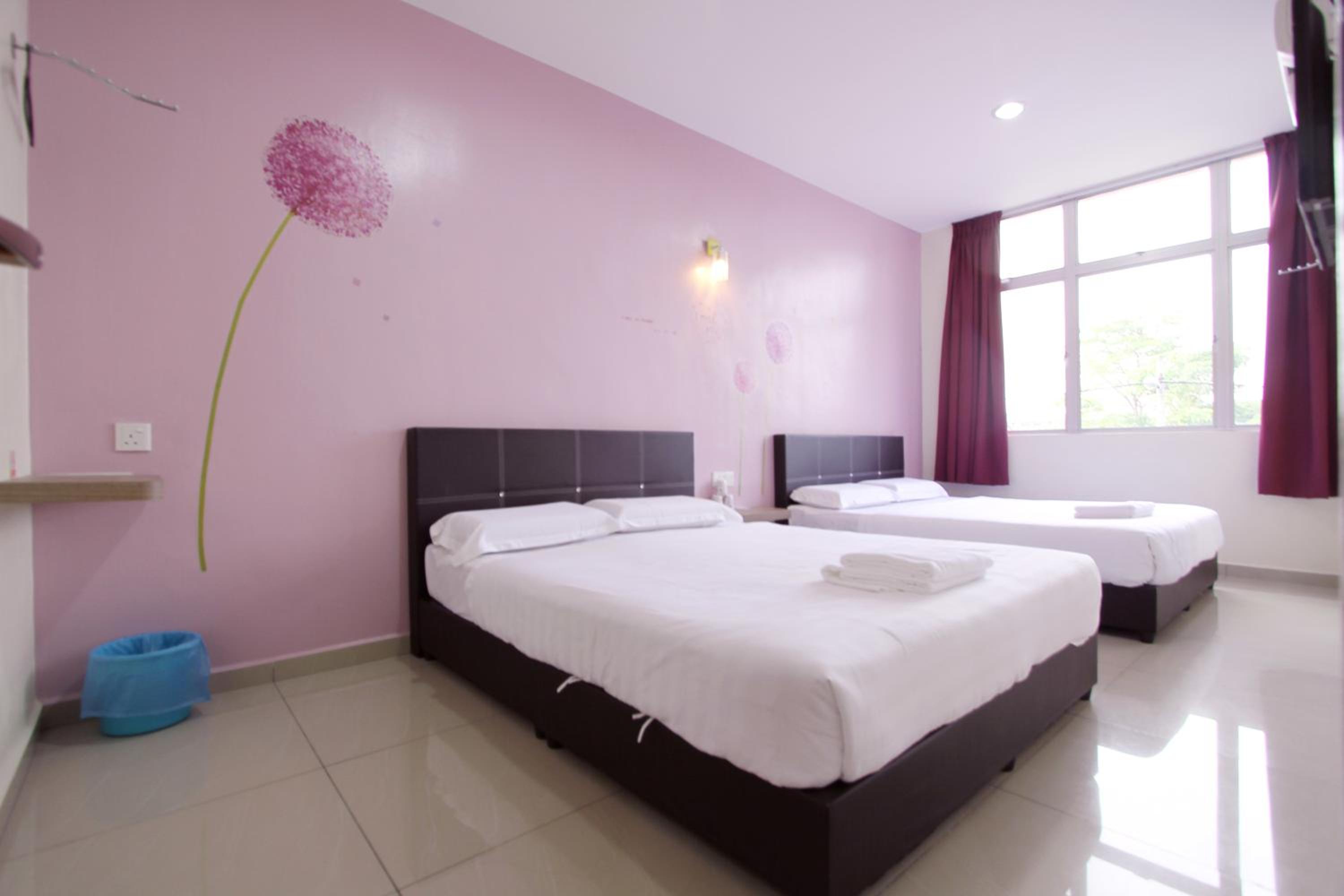 Deluxe Queen Room with Two Queen Beds photo 3