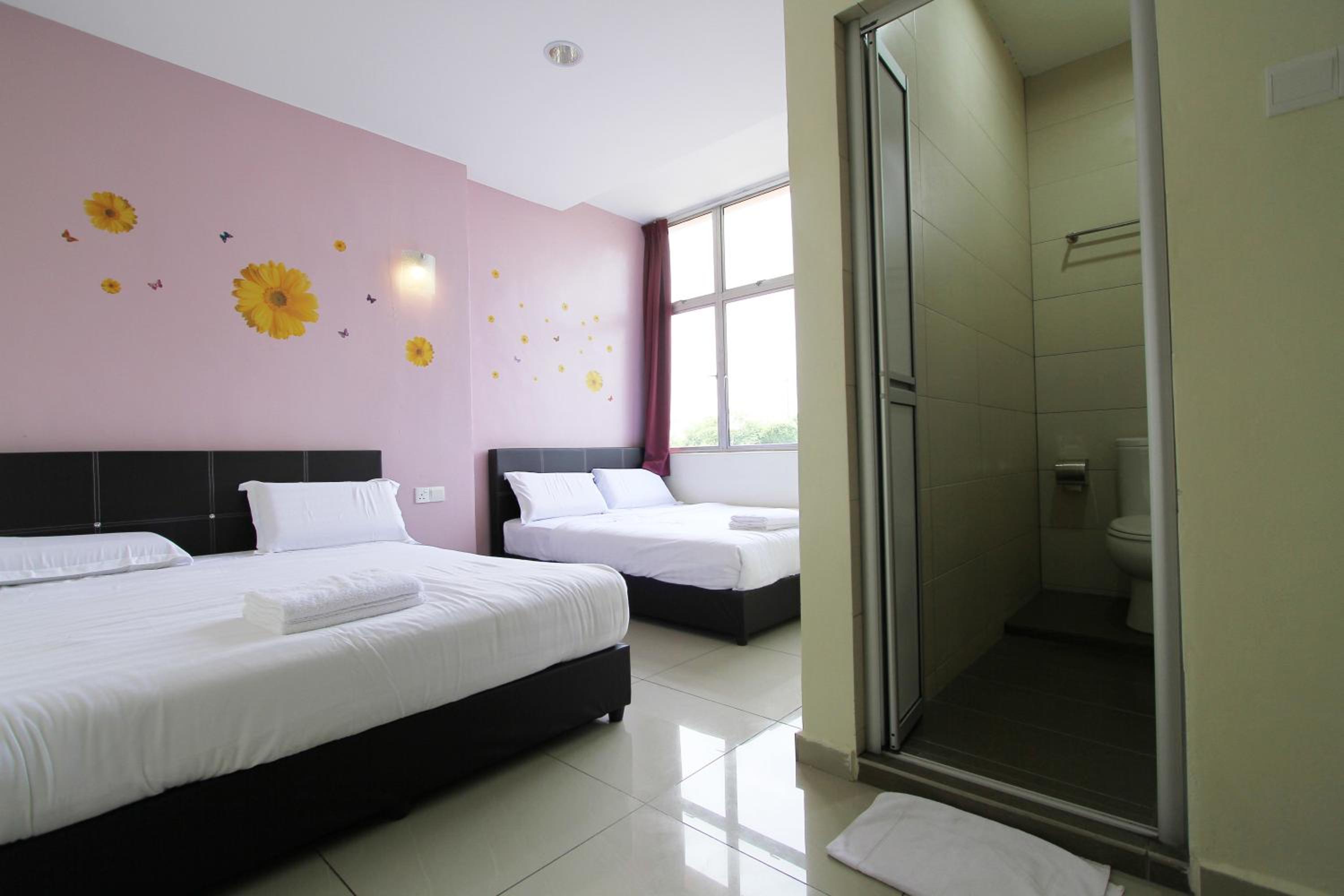 Deluxe Queen Room with Two Queen Beds photo 2