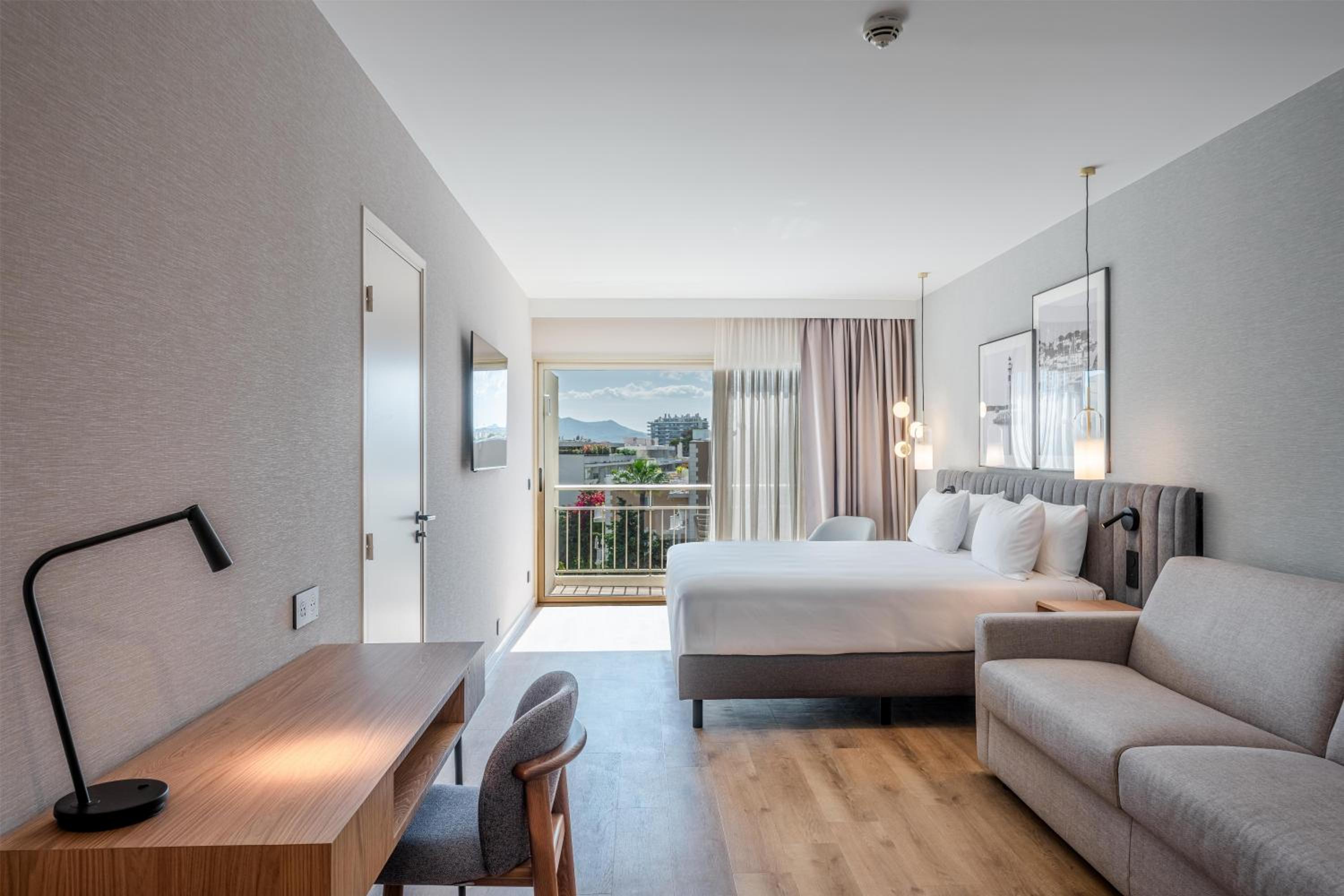 Junior Suite with Garden View and Balcony