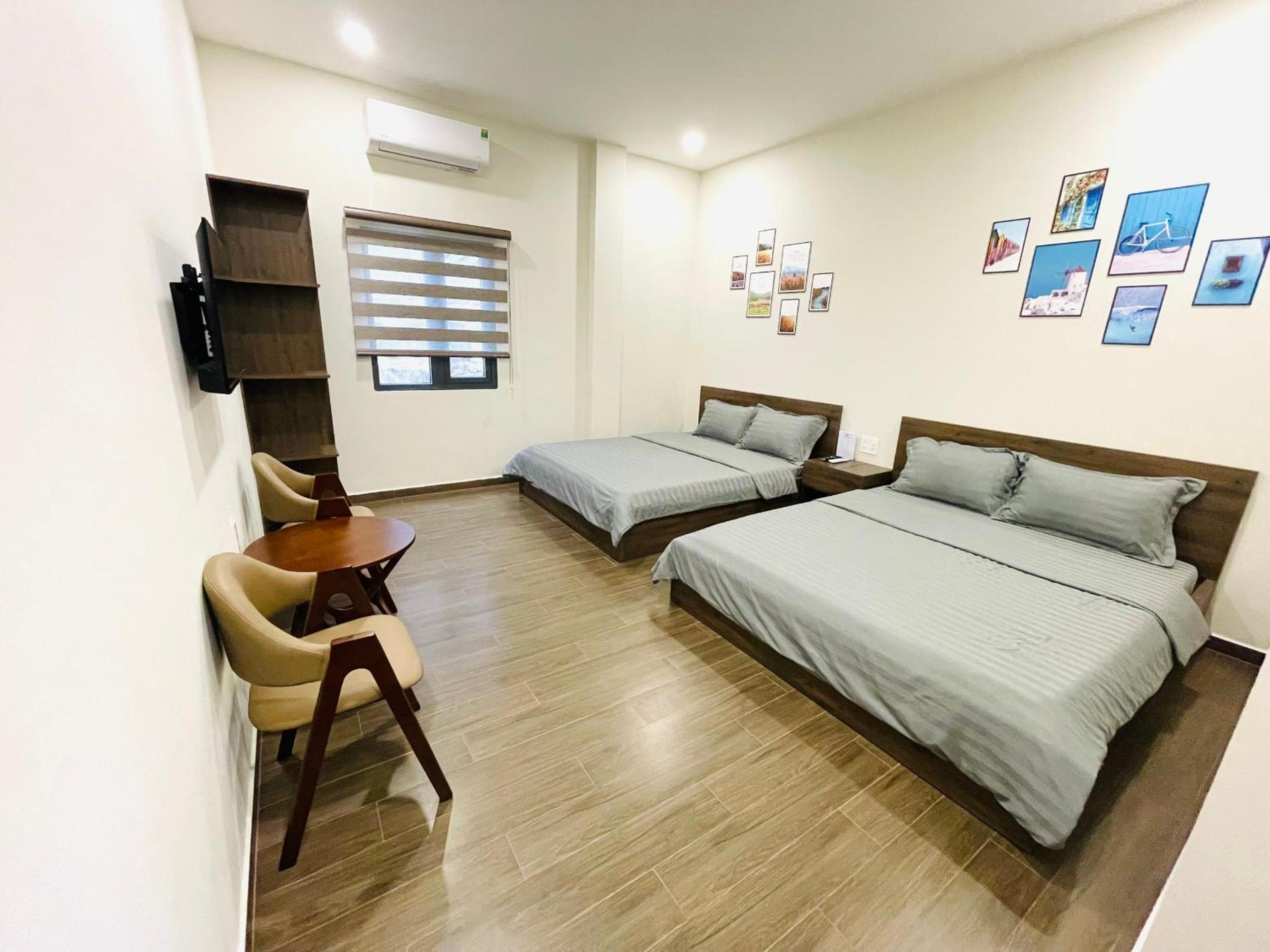 Quadruple Room with Private Bathroom - Photo 1