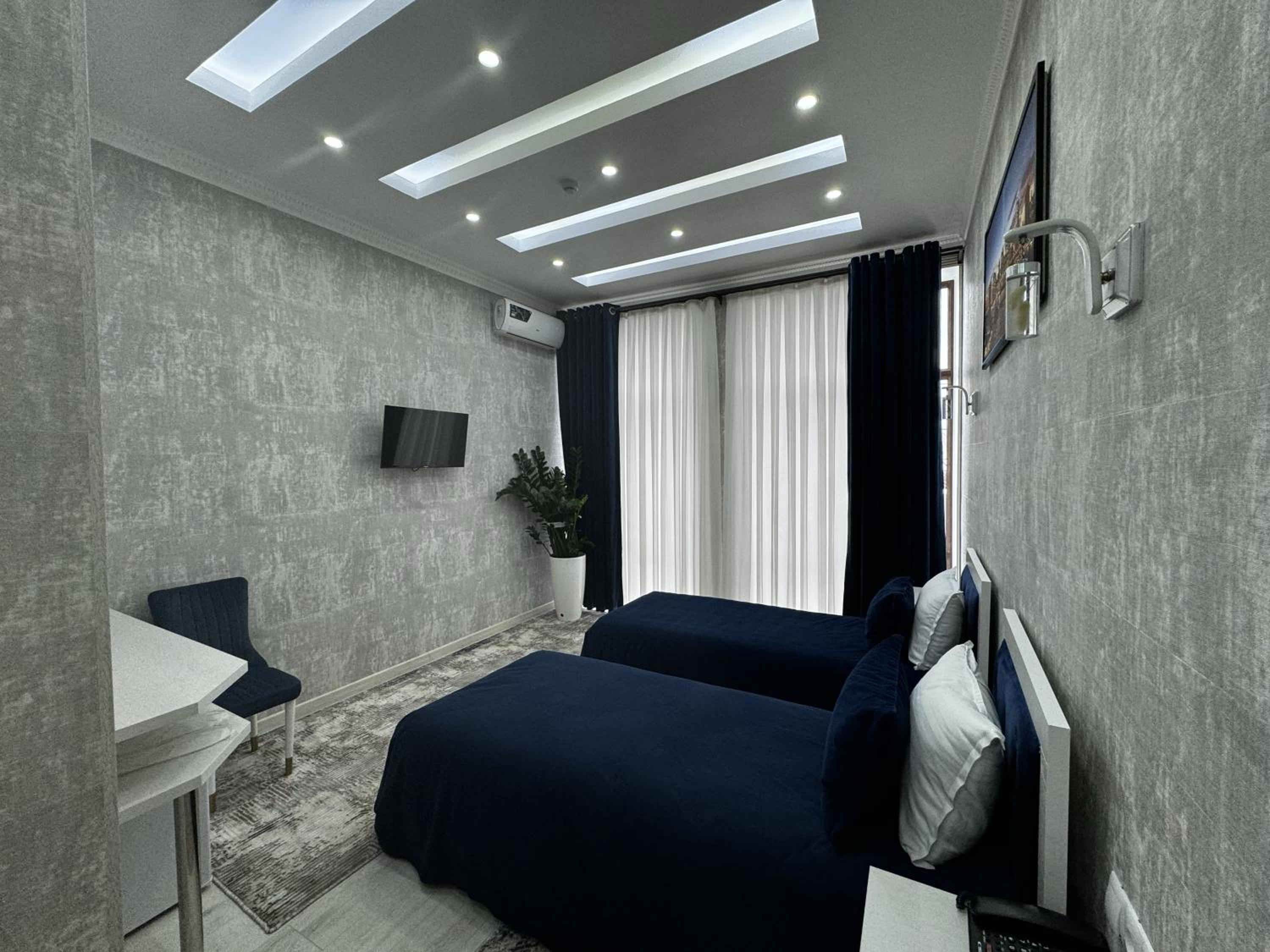 Twin Room - Photo 1