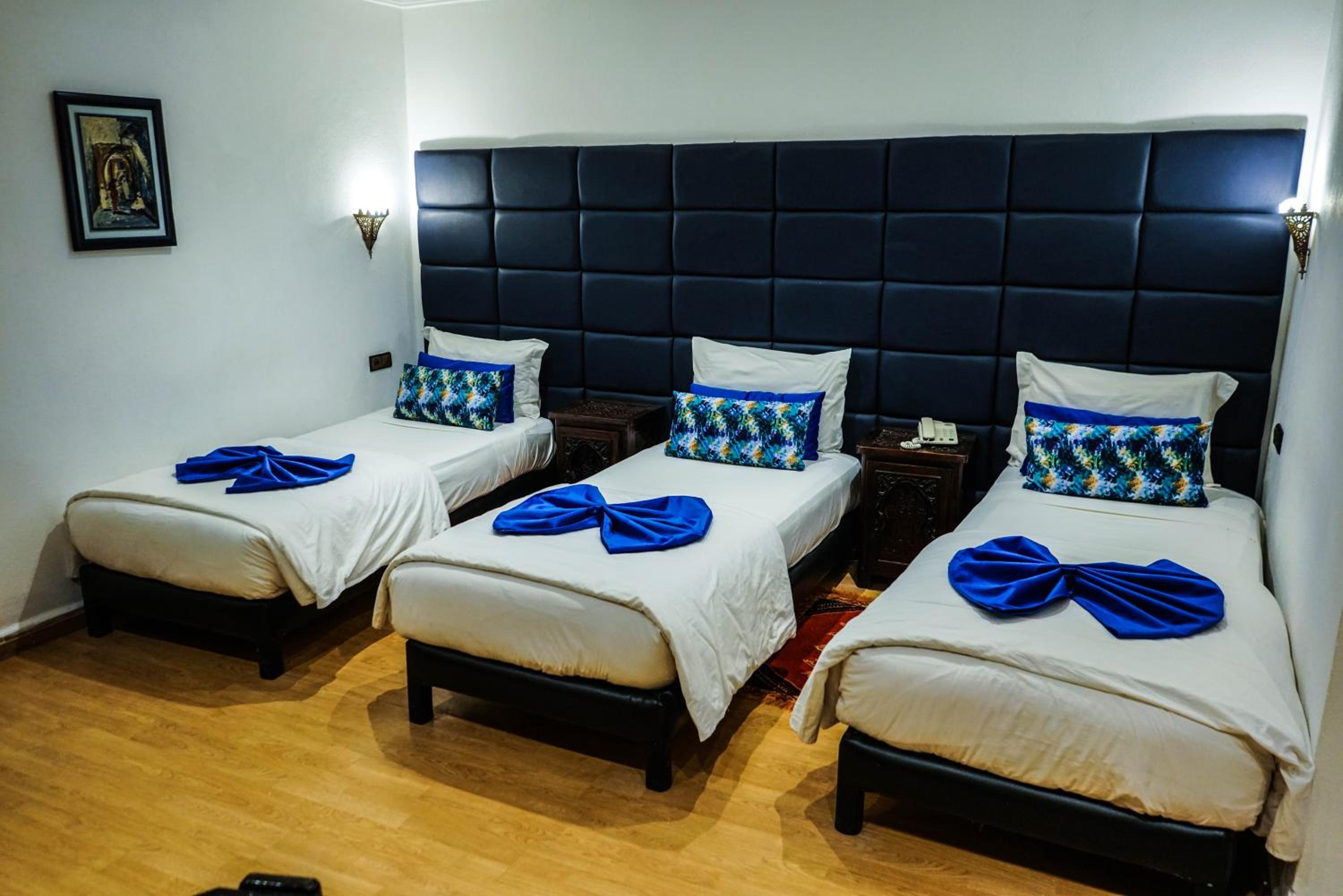 Triple Room - Photo 1