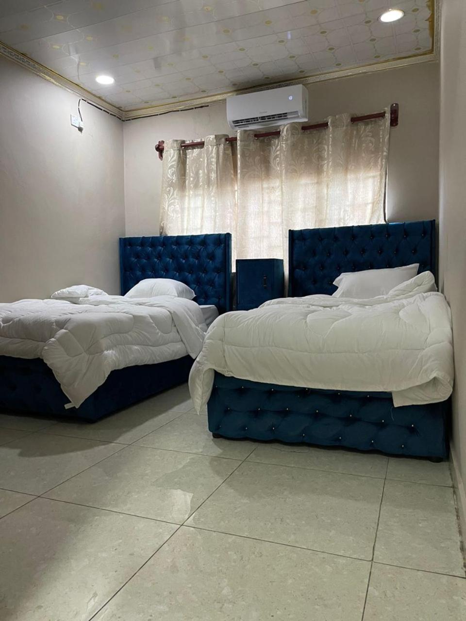 Single Bed In Male Dormitory Room