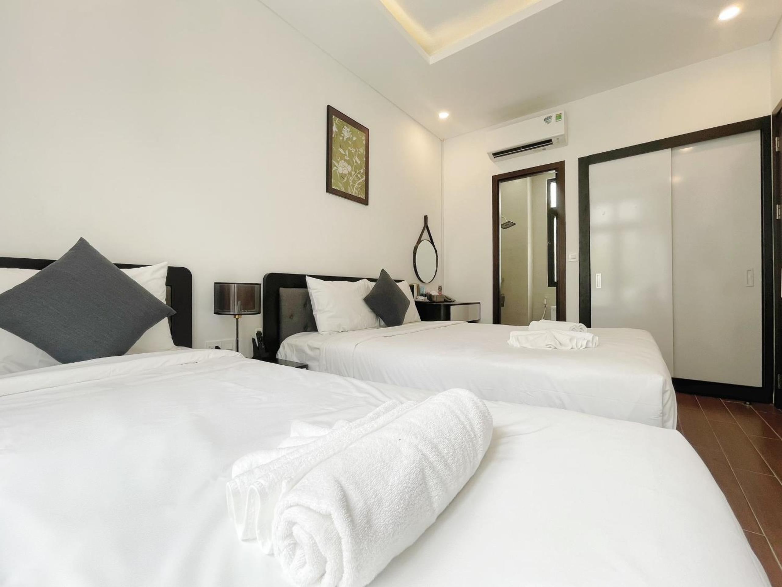 Deluxe Triple Room