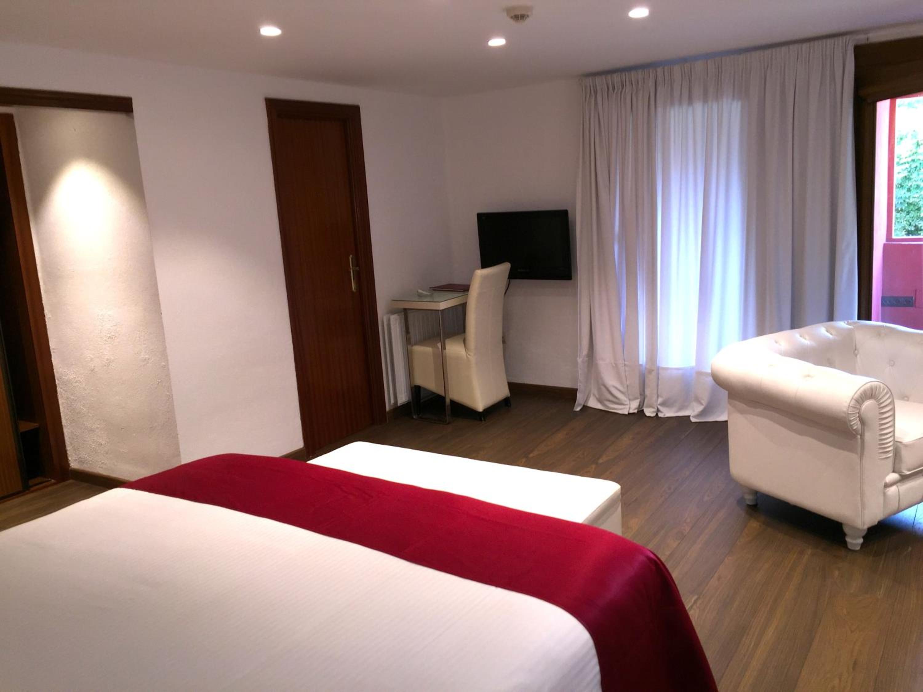 Suite Junior con Chimenea y Acceso al Spa Suite Junior con Chimenea y Acceso al Spa