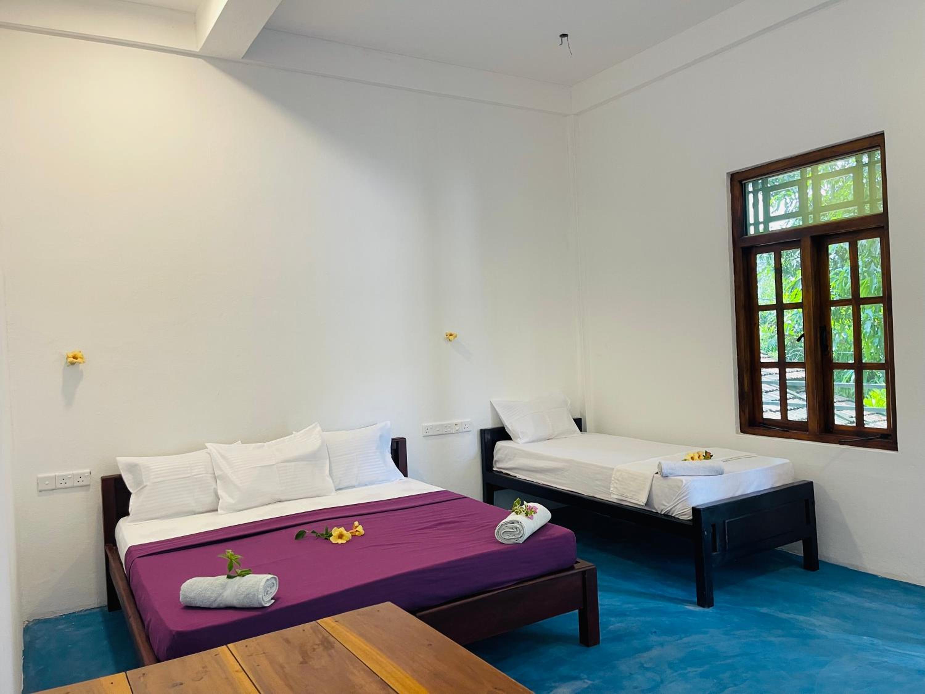 Deluxe Triple Room