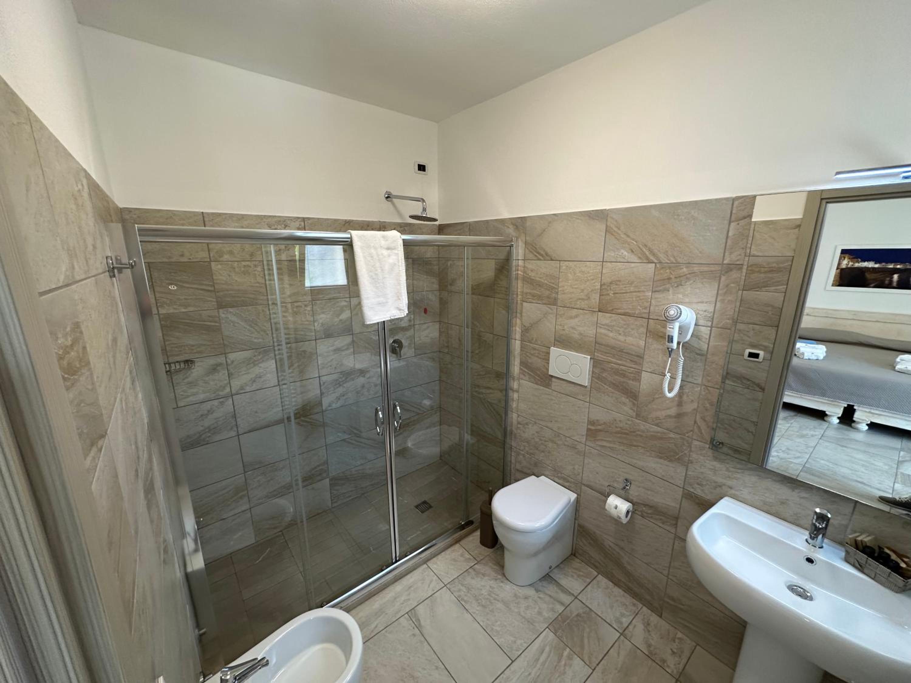 Double Room (2 Adults + 1 Child) photo 2