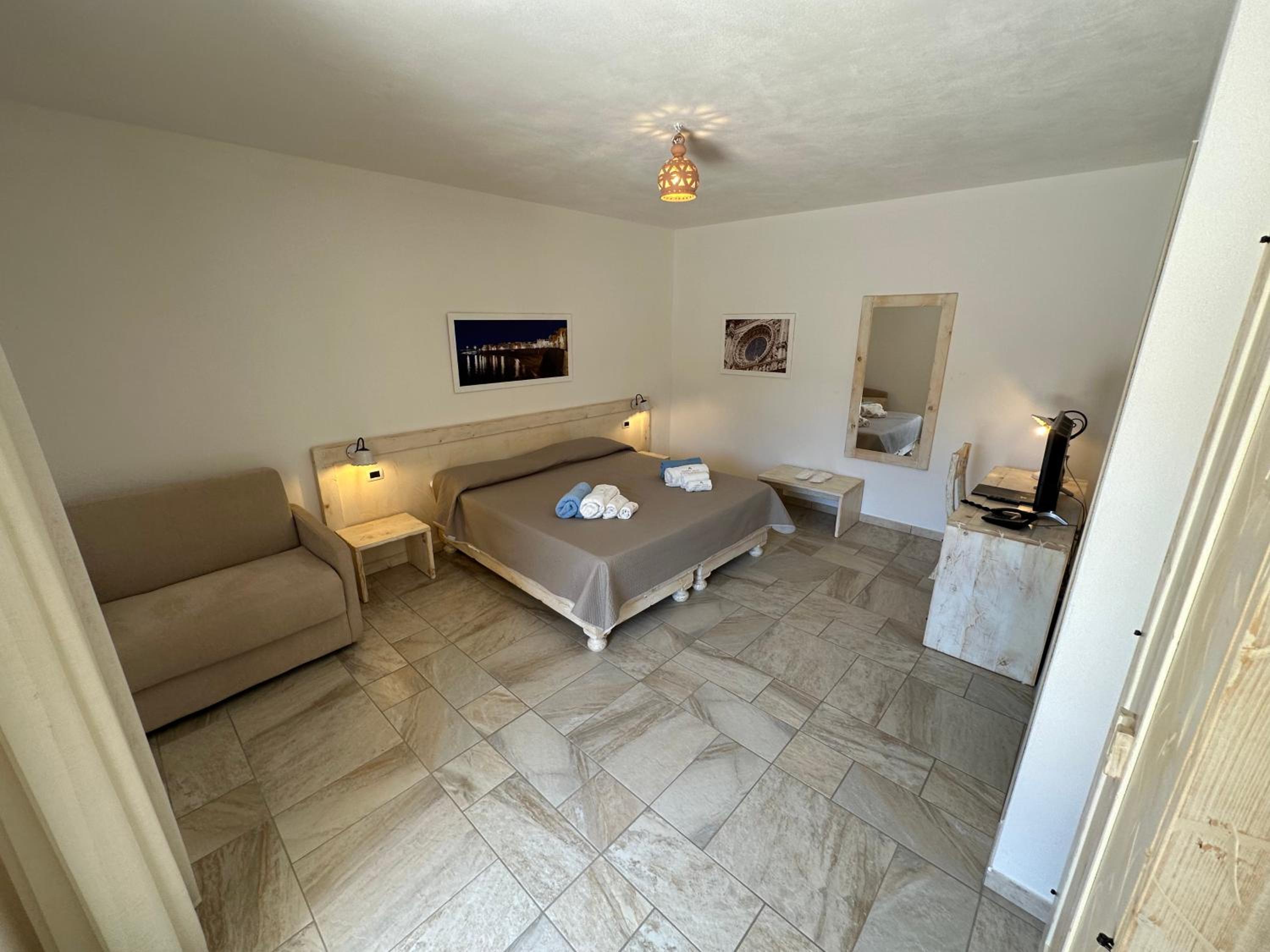 Double Room (2 Adults + 1 Child) photo 1