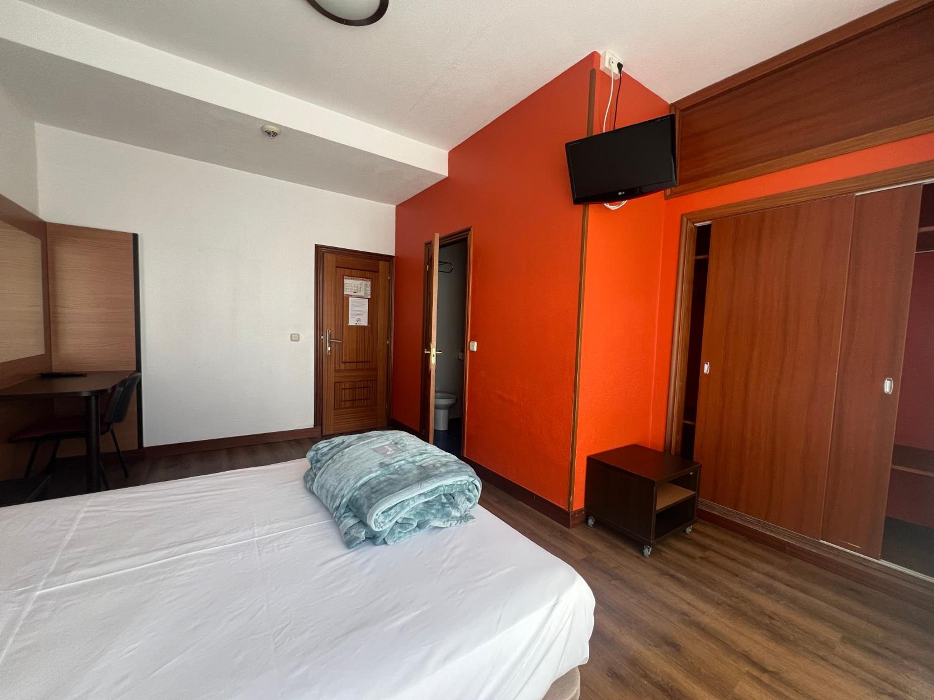 Habitación Estándar con Cama Queen