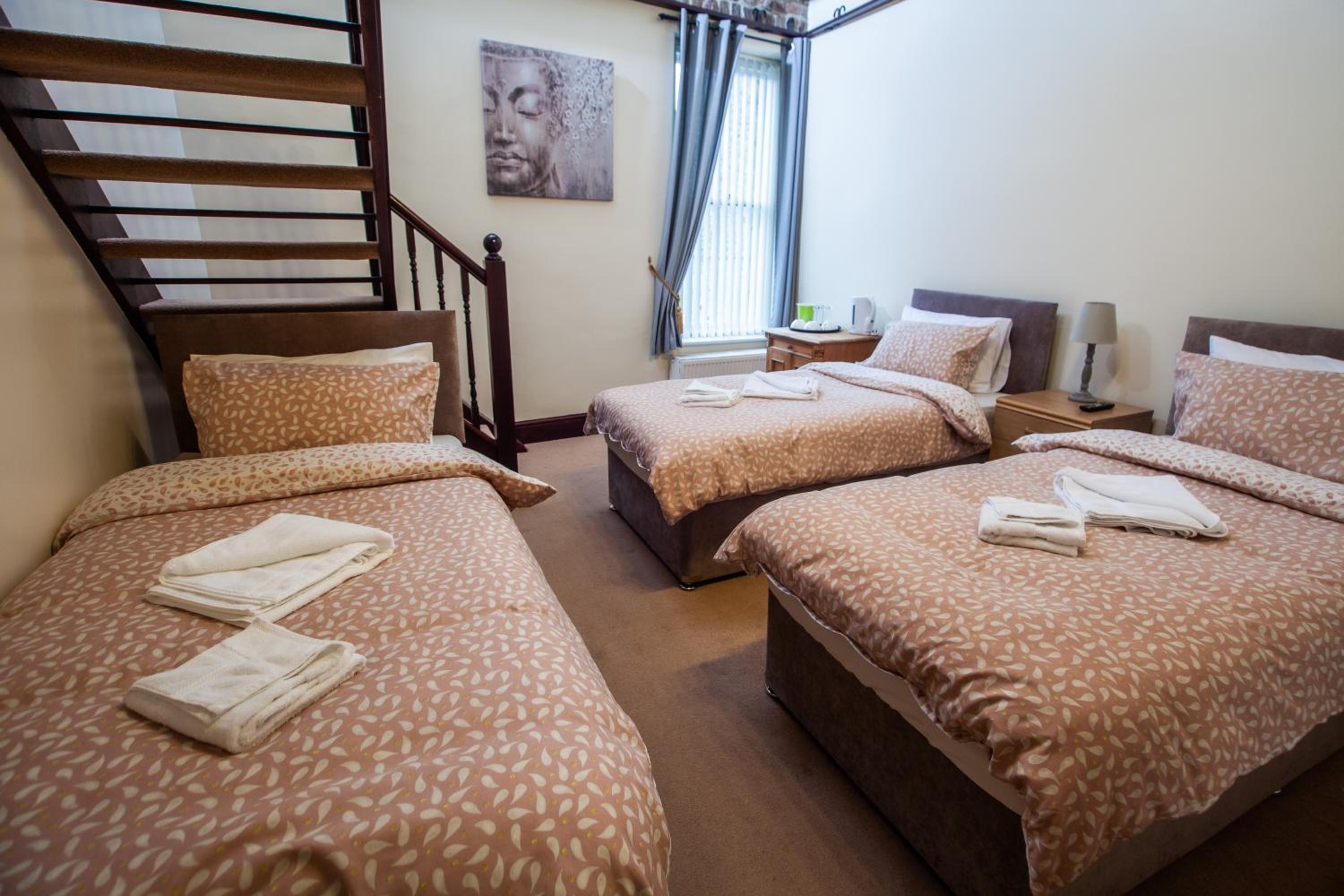 Deluxe Triple Room