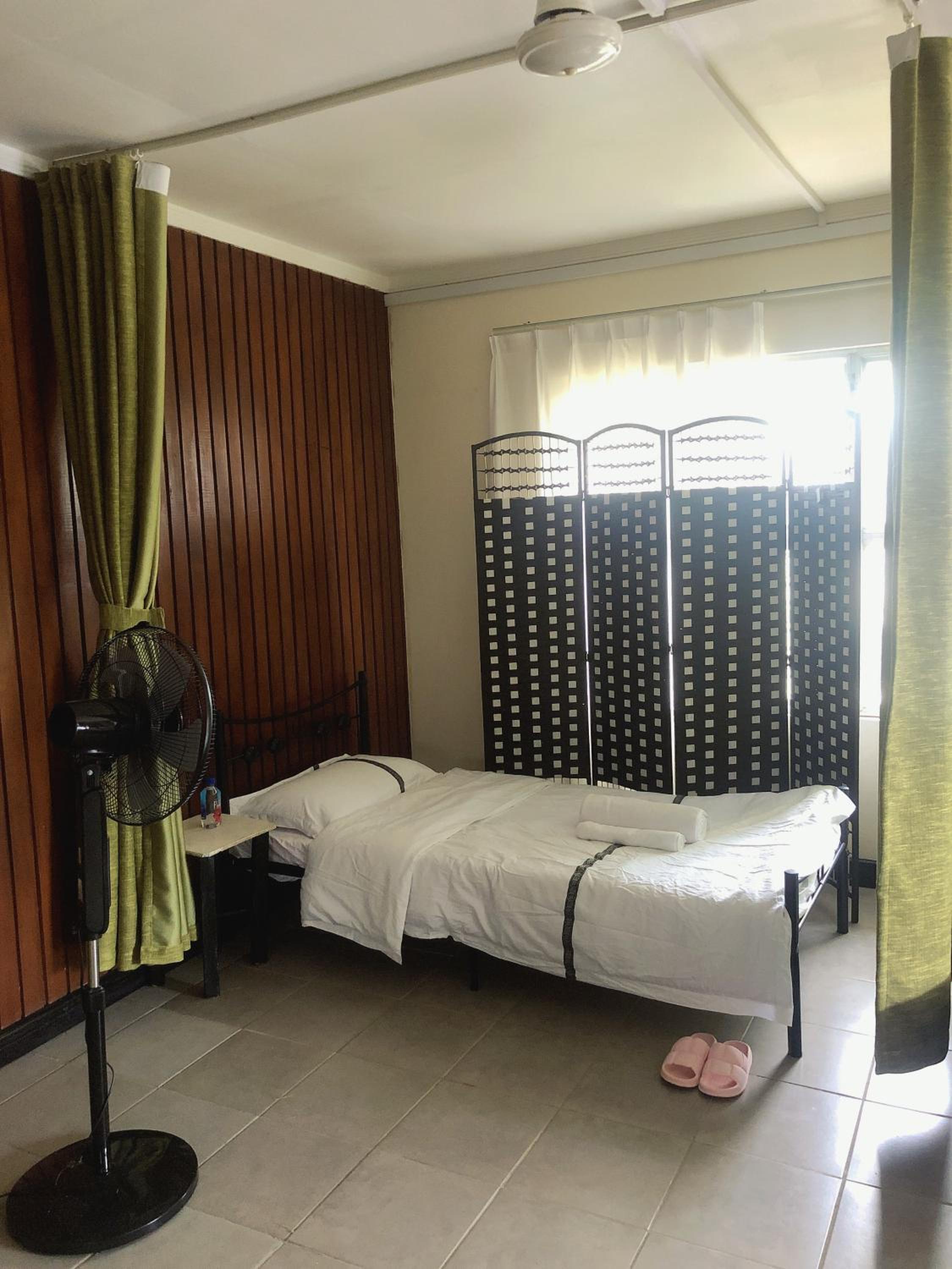 Single Bed In Dormitory Room photo 1