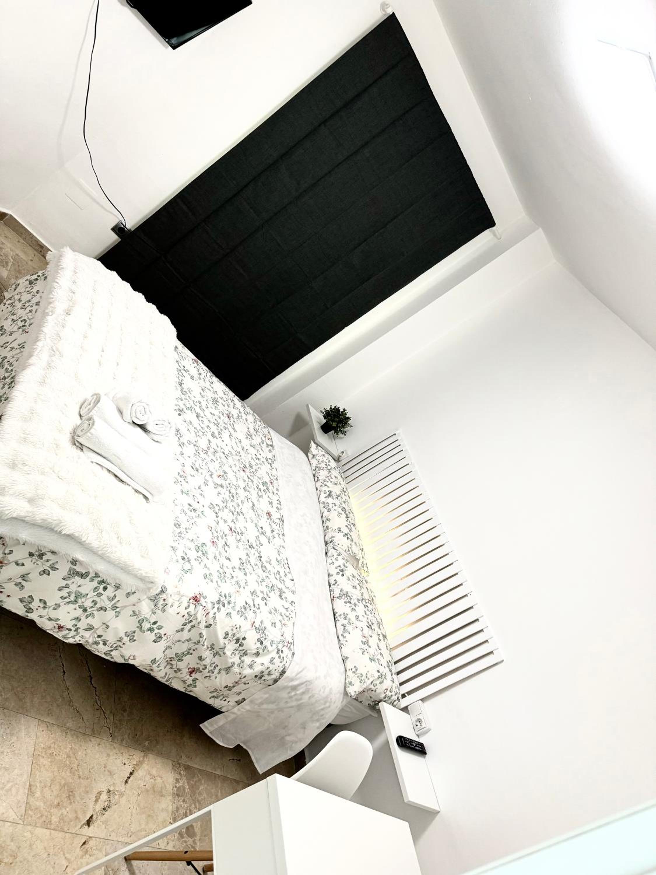 Habitación doble con baño compartido