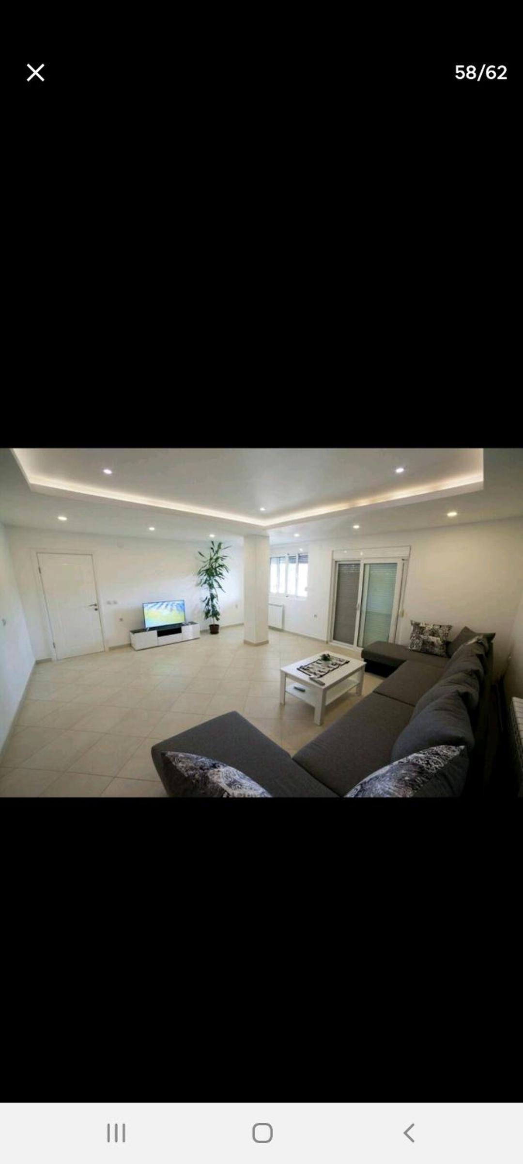 Three-Bedroom Apartment photo 1