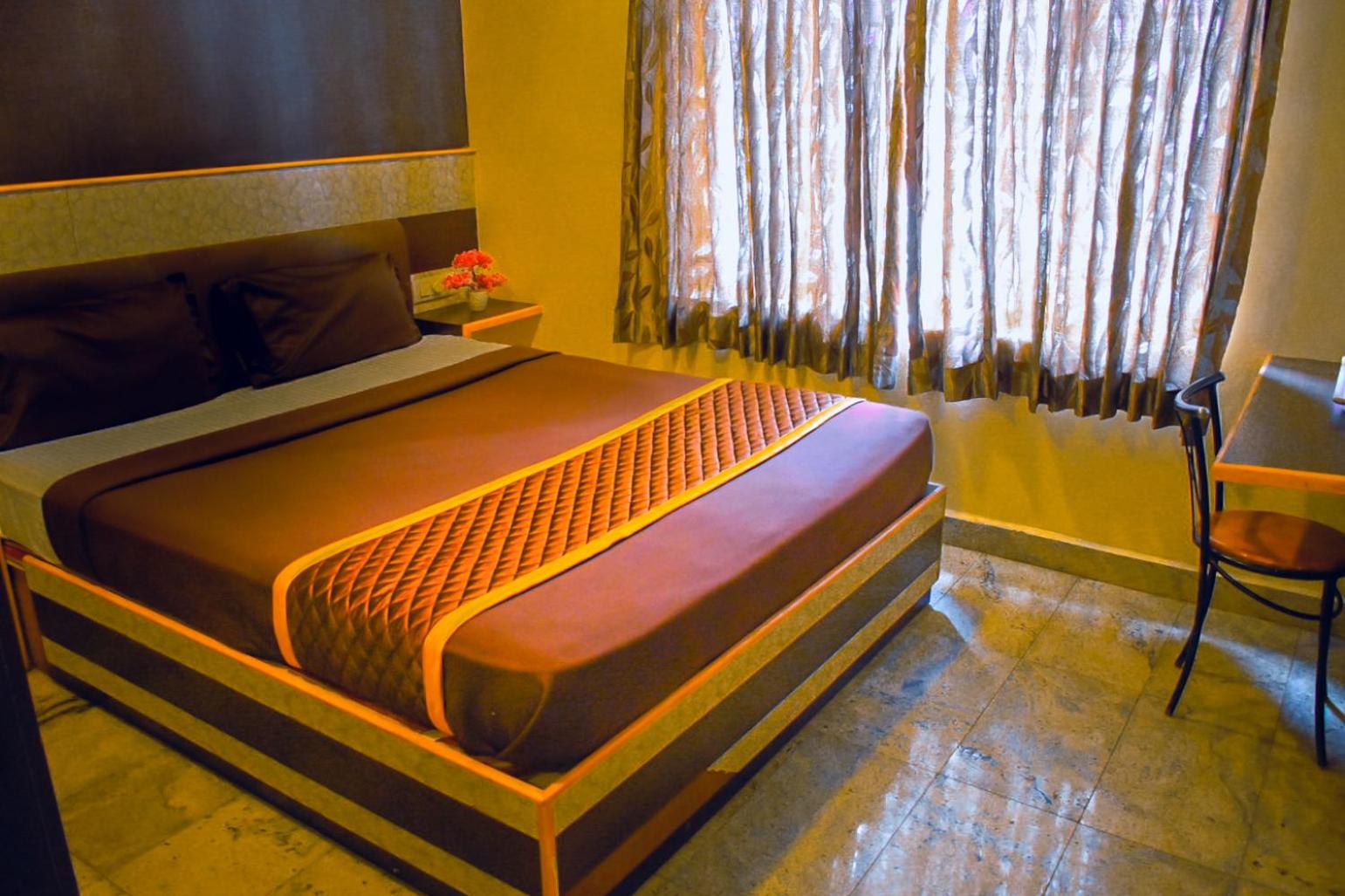Deluxe Room - Photo 1