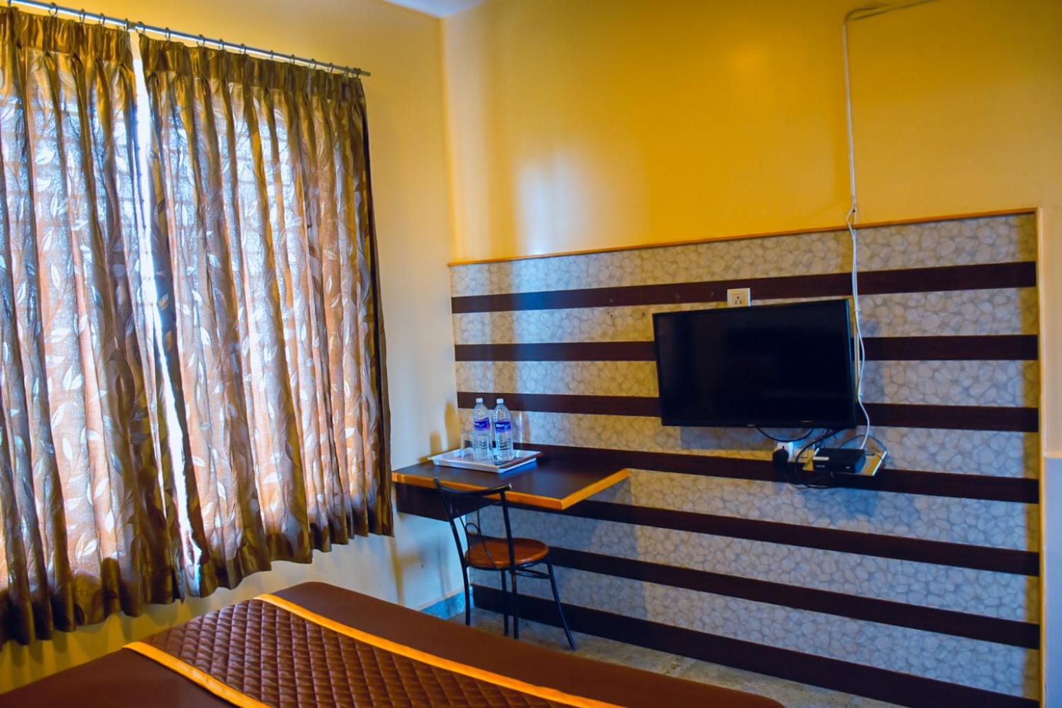 Deluxe Room - Photo 5