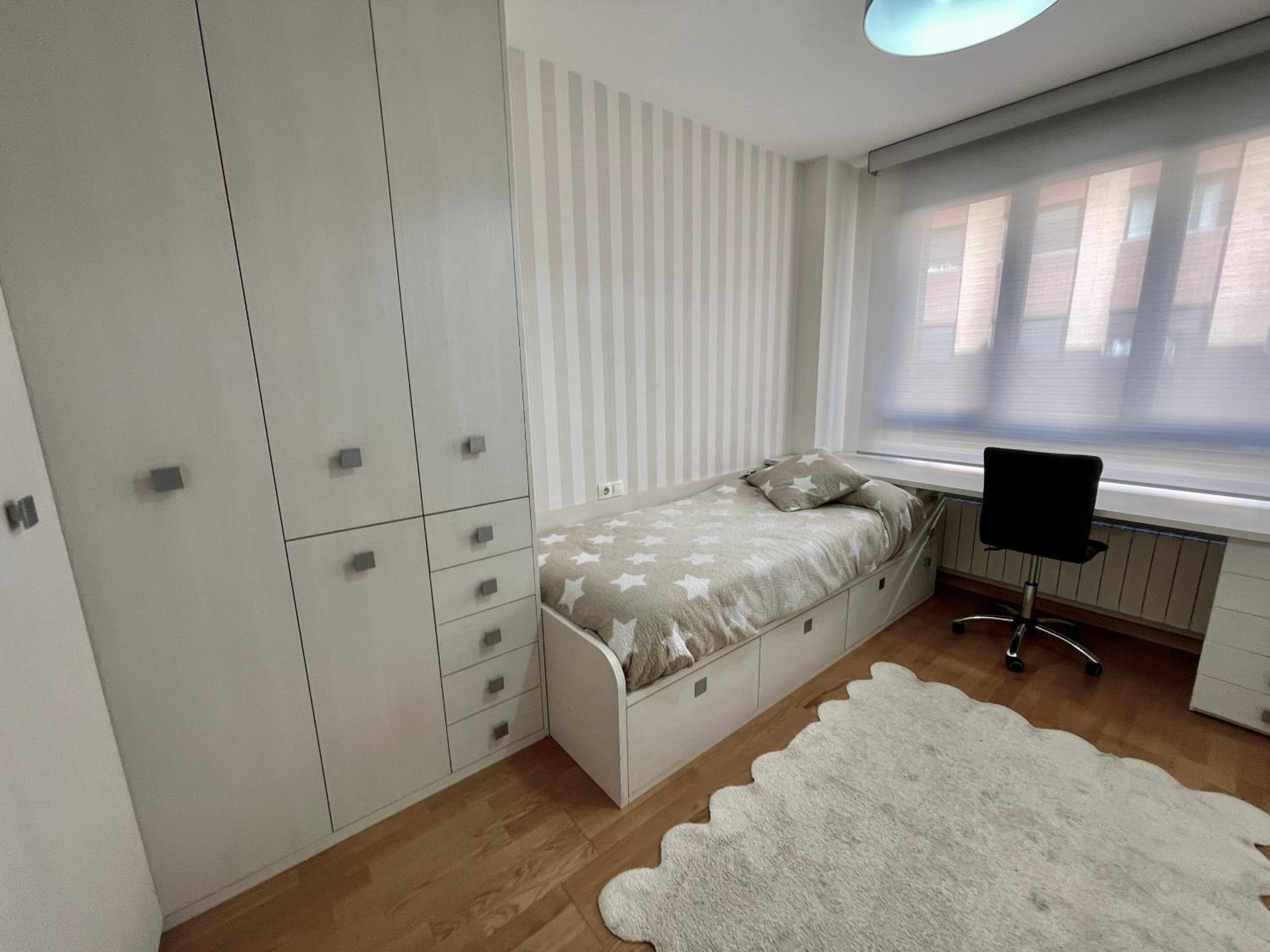 Three-Bedroom Apartment photo 2