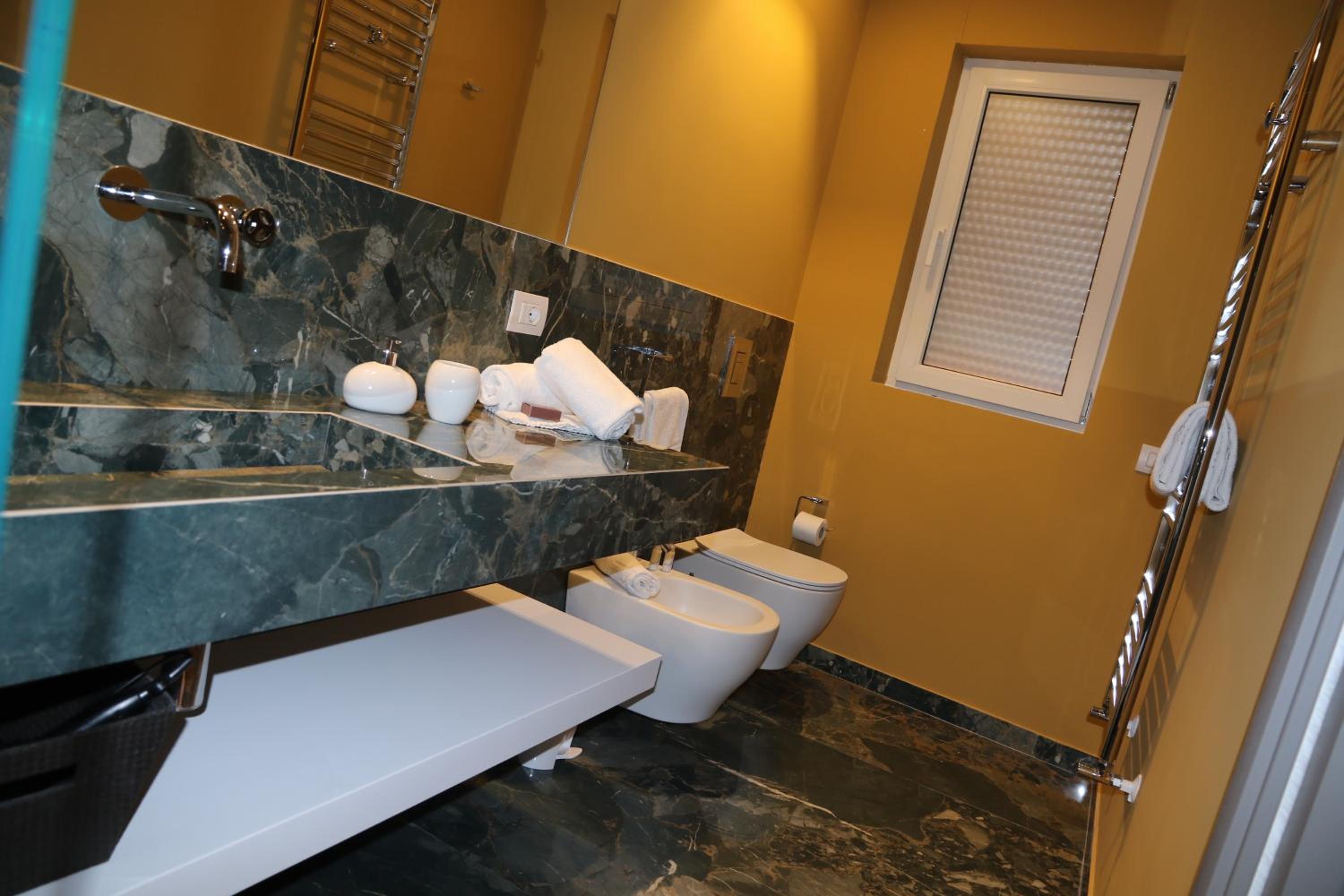 Three-Bedroom Apartment - Photo 32
