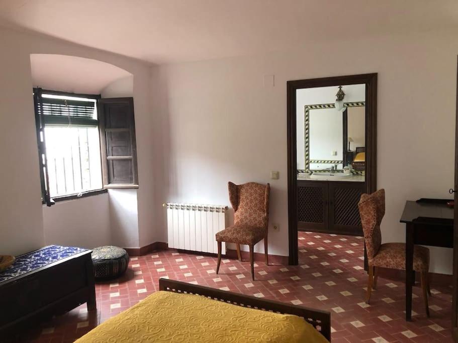 Casa de cuatro habitaciones