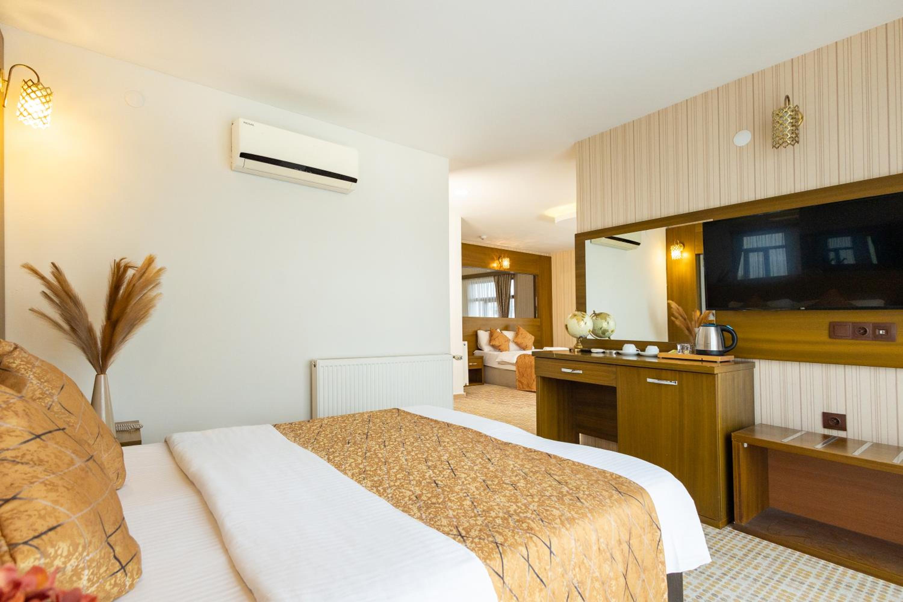 Deluxe Quadruple Room - Photo 6