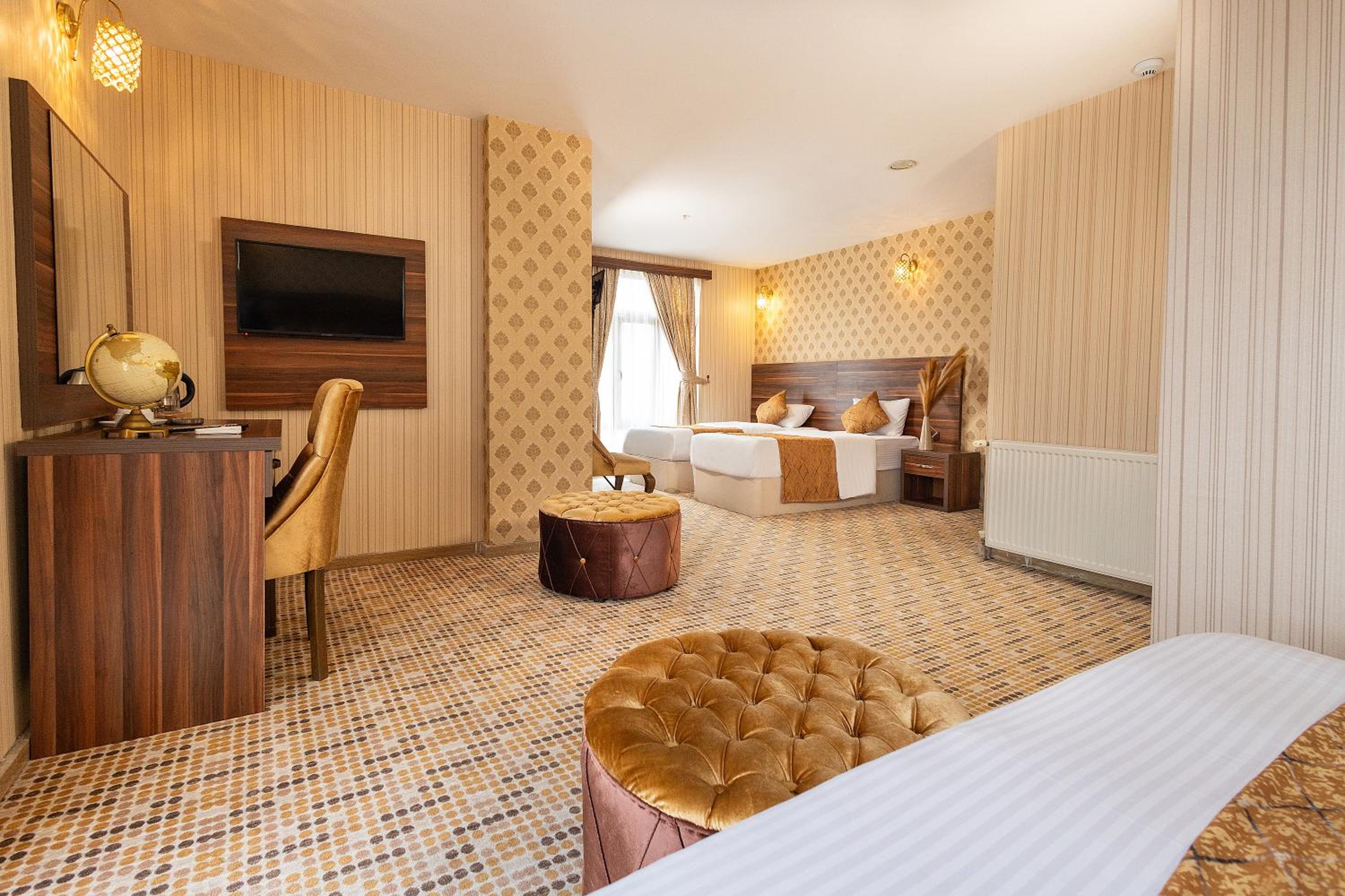 Deluxe Quadruple Room - Photo 11