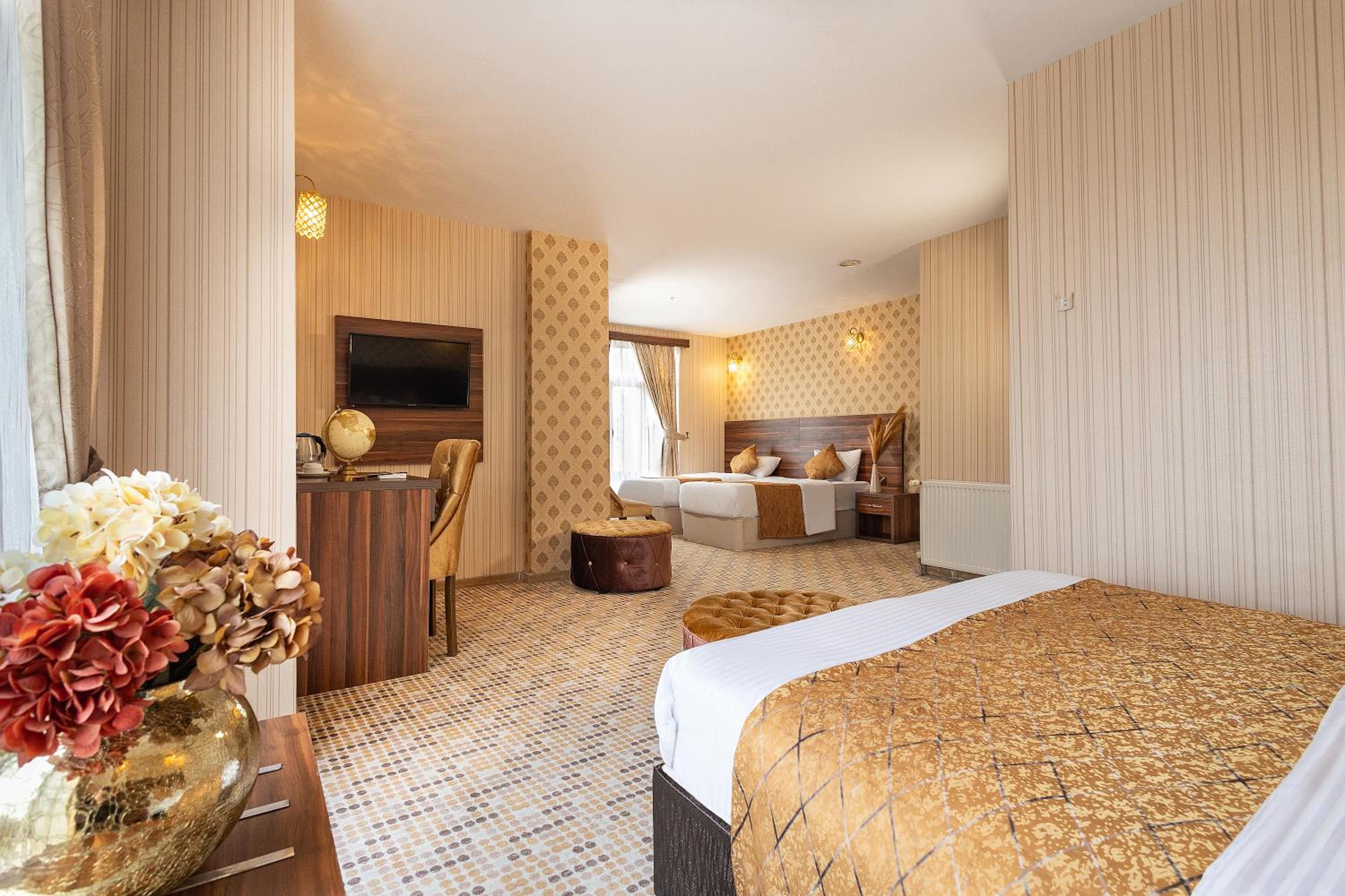 Deluxe Quadruple Room - Photo 1