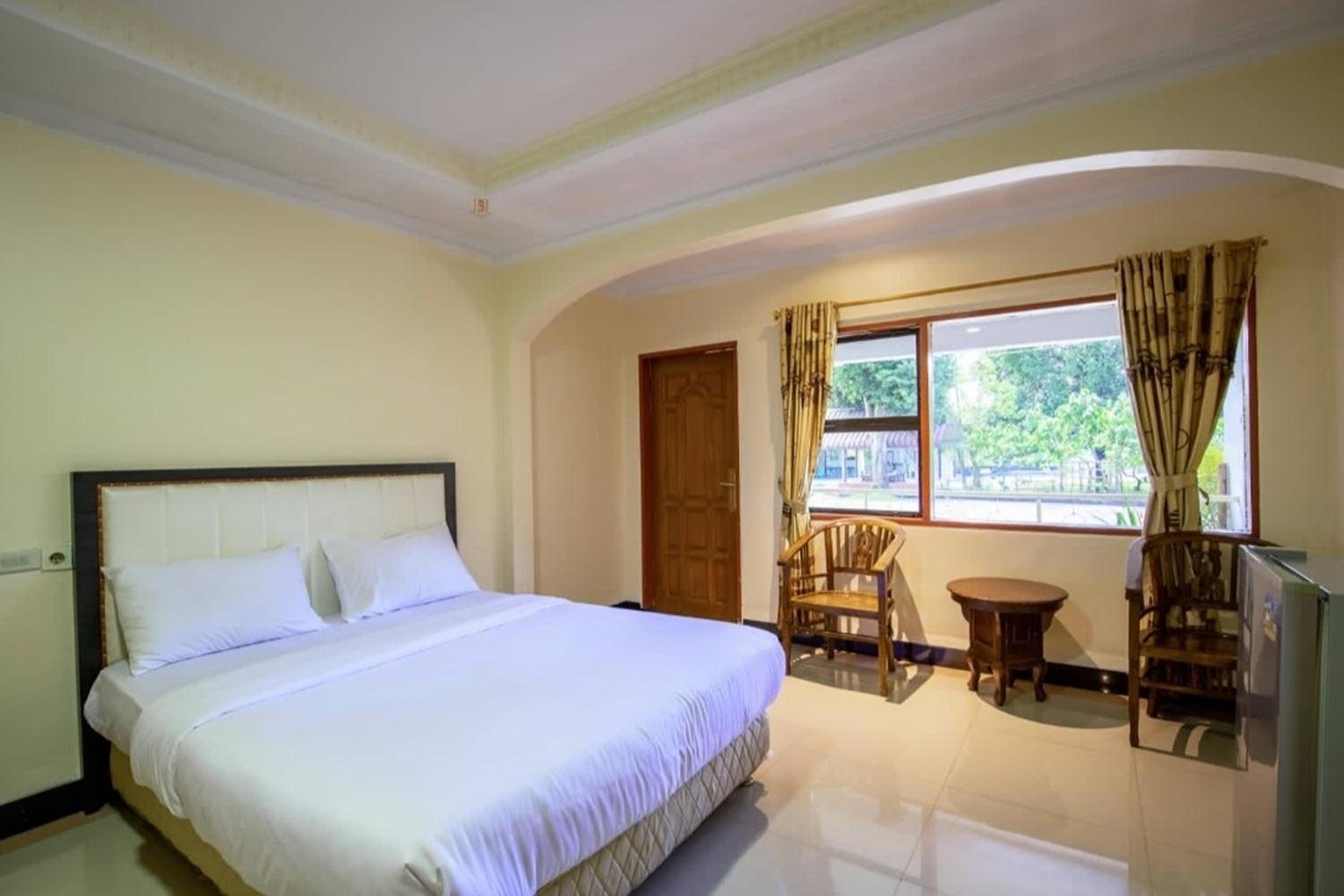Deluxe Room - Photo 5