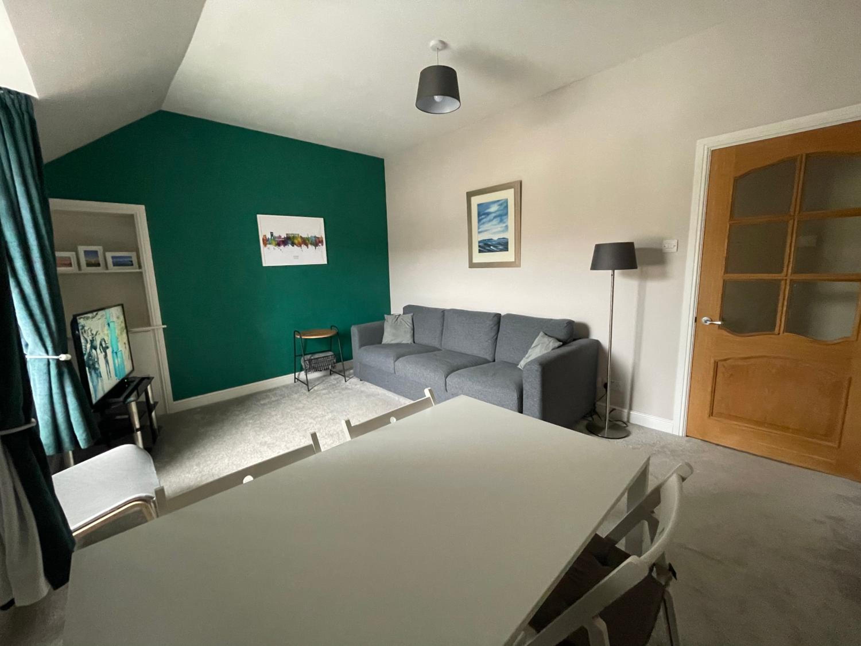 Three-Bedroom Apartment photo 1