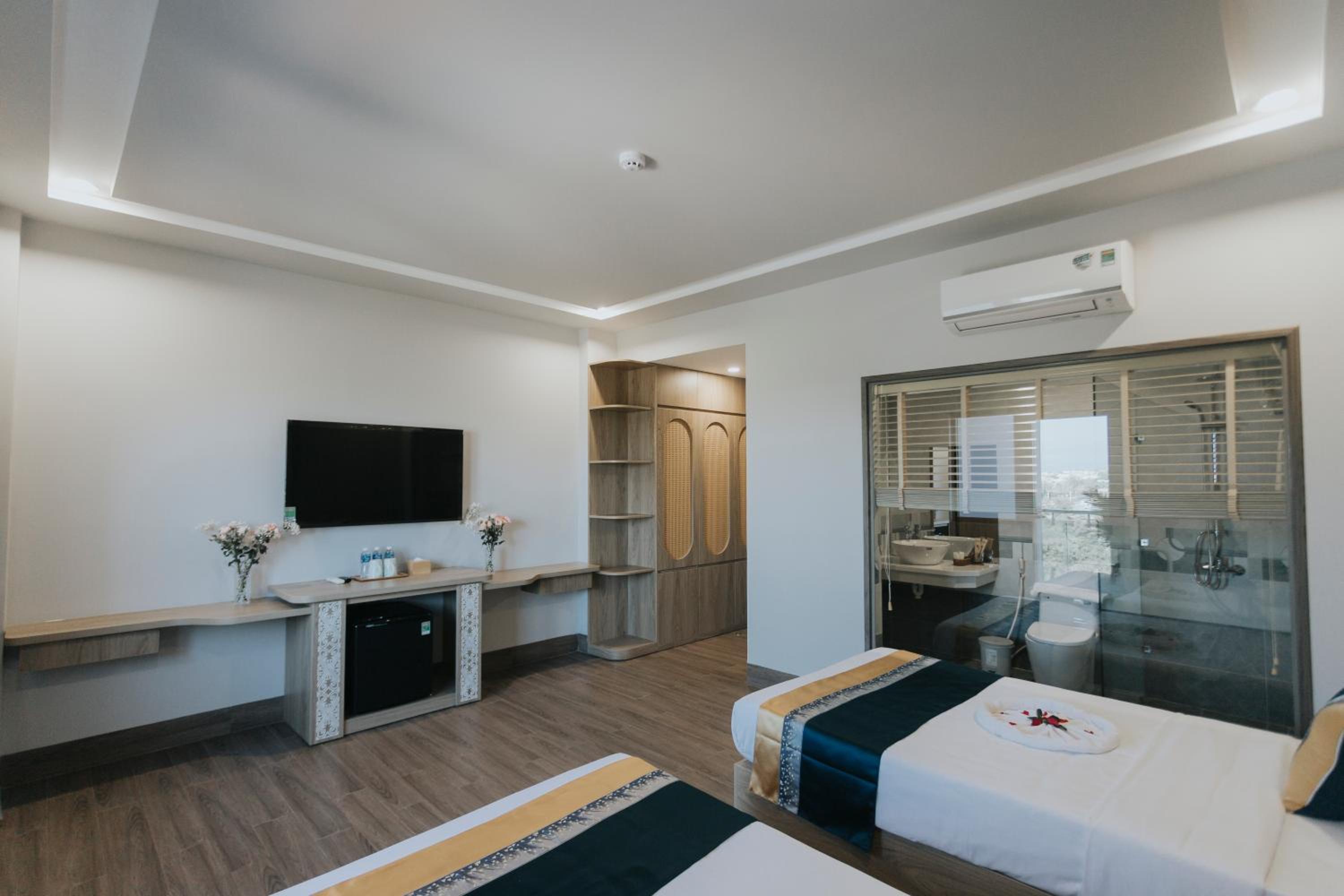 Deluxe Quadruple Room - Photo 4