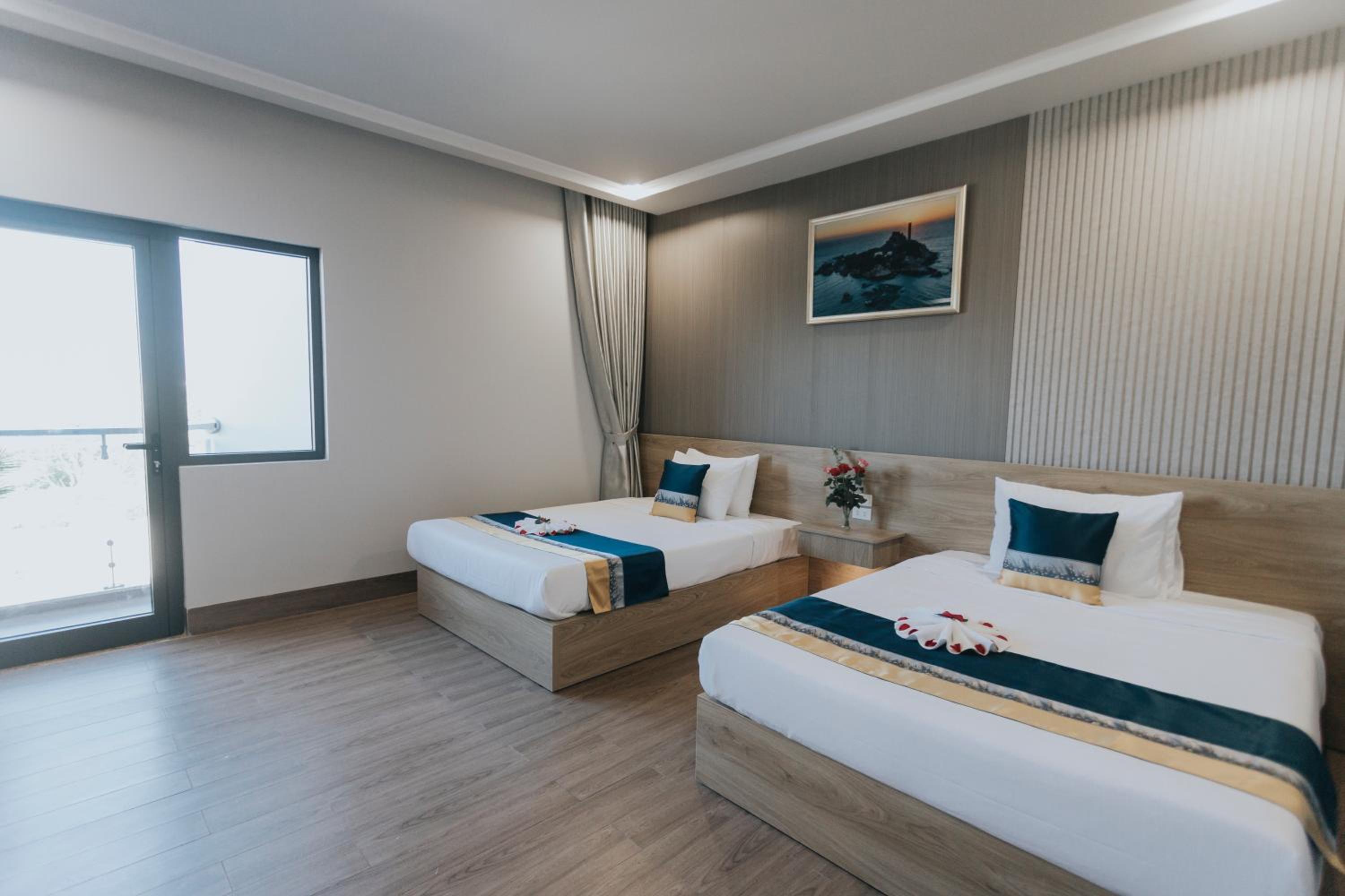 Deluxe Triple Room - Photo 3