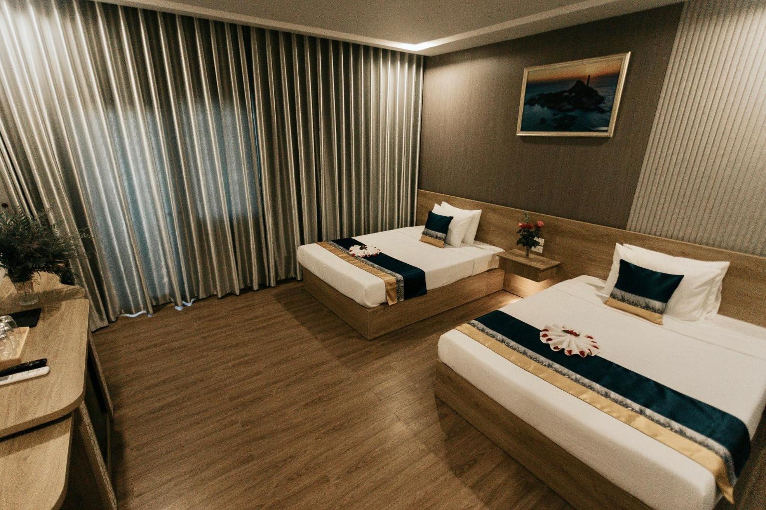 Deluxe Triple Room - Photo 5