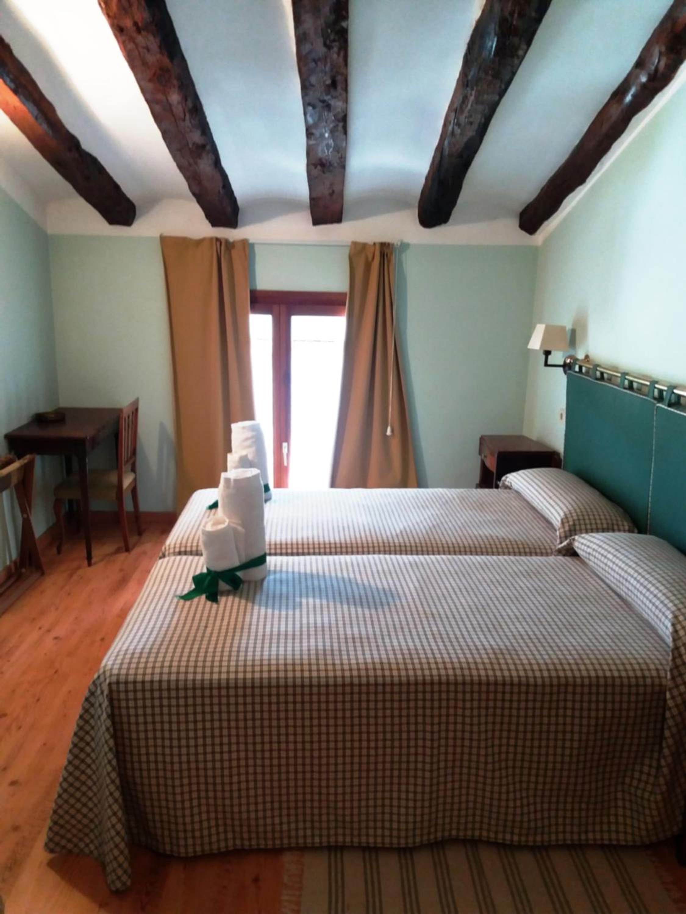 Habitación Doble con Dos Camas Dobles