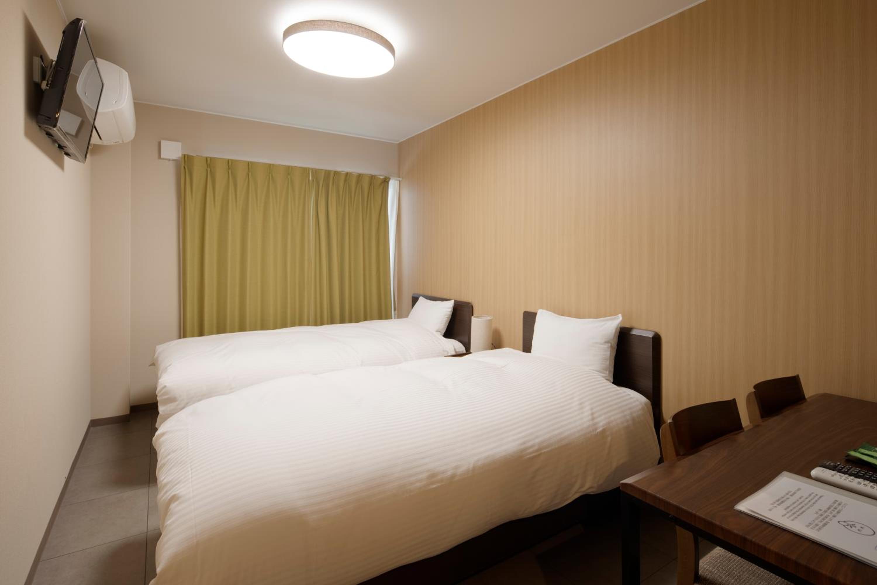 Twin Room - Photo 1
