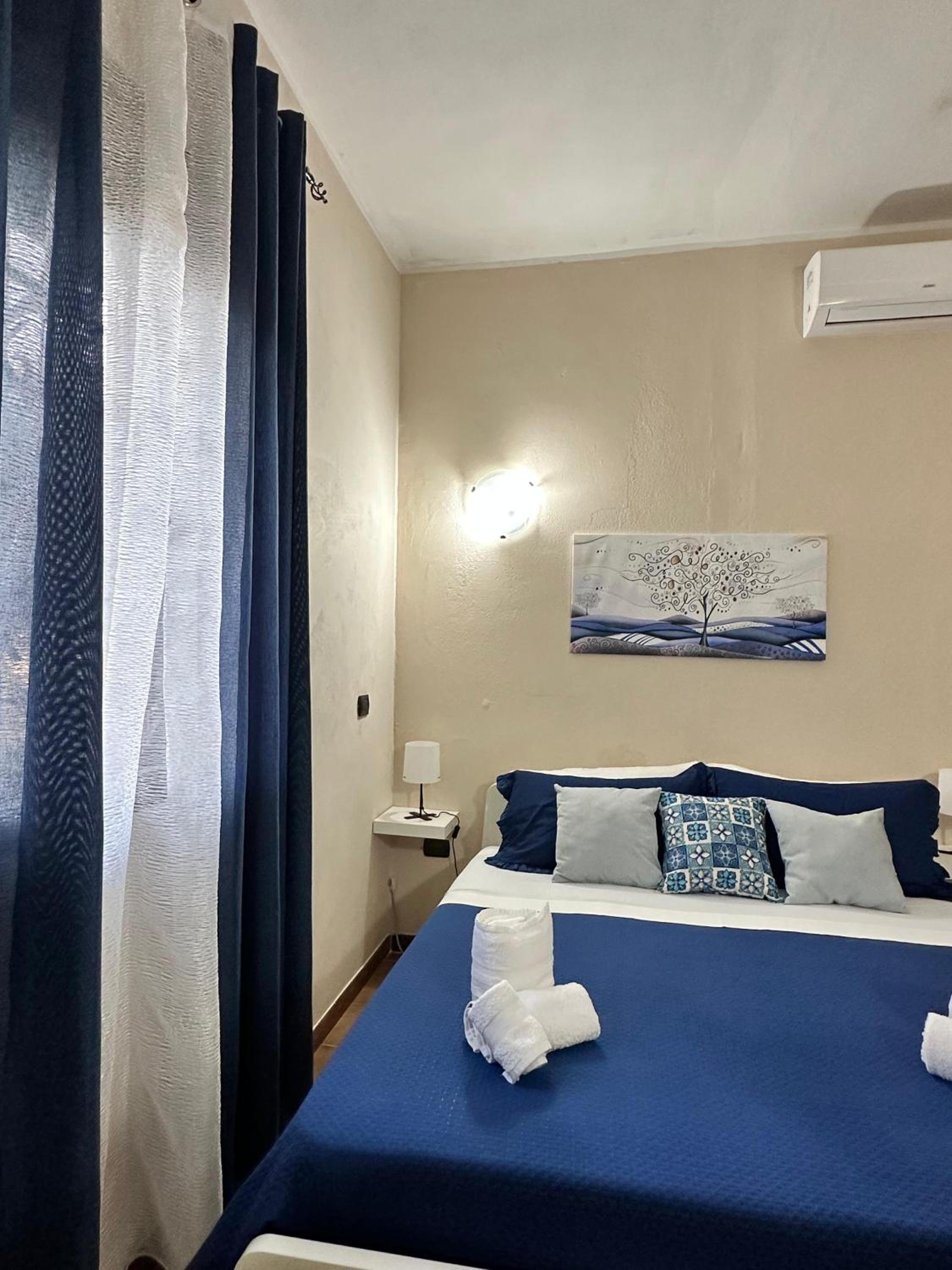 Quadruple Room with Private Bathroom