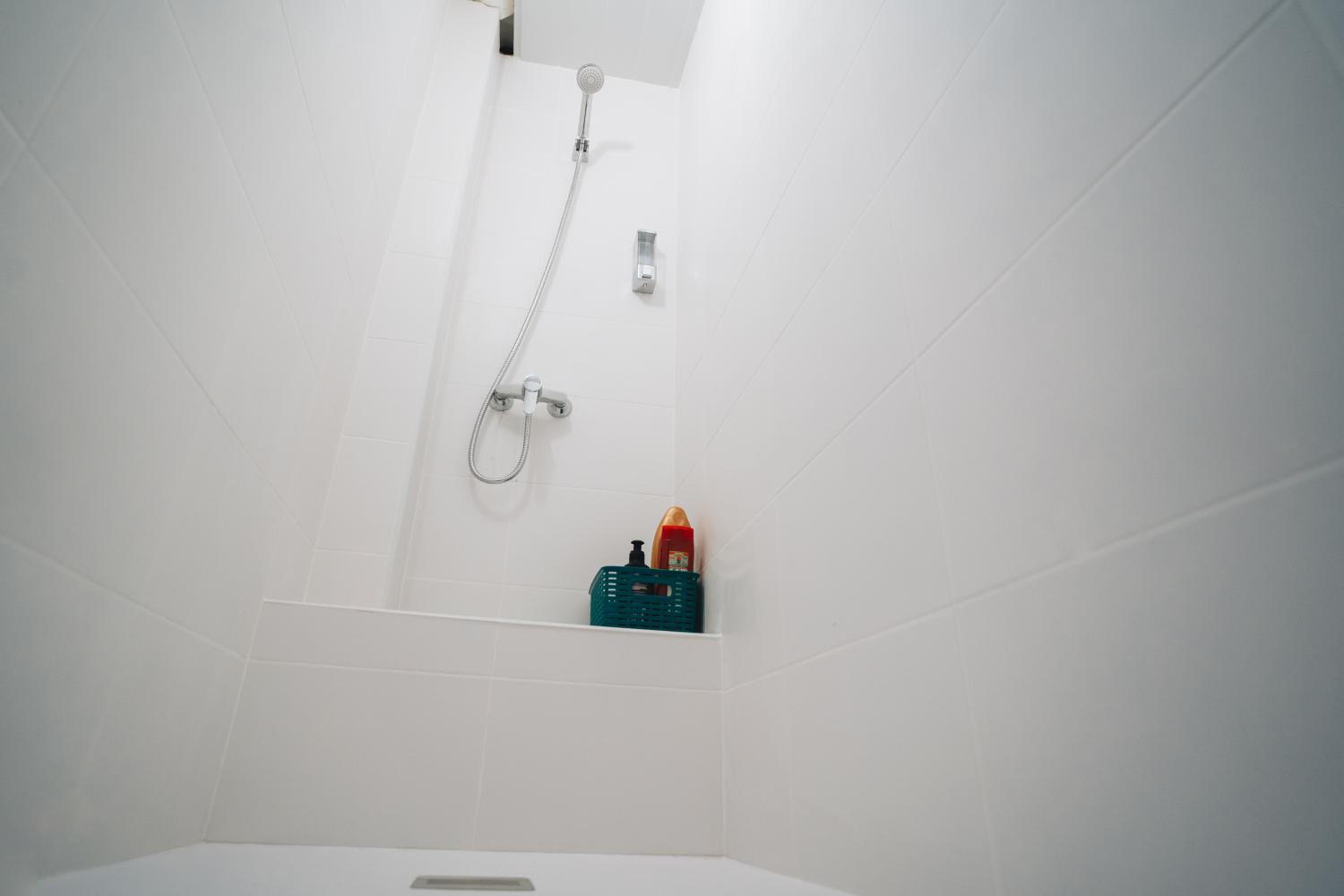 Habitación individual con baño compartido
